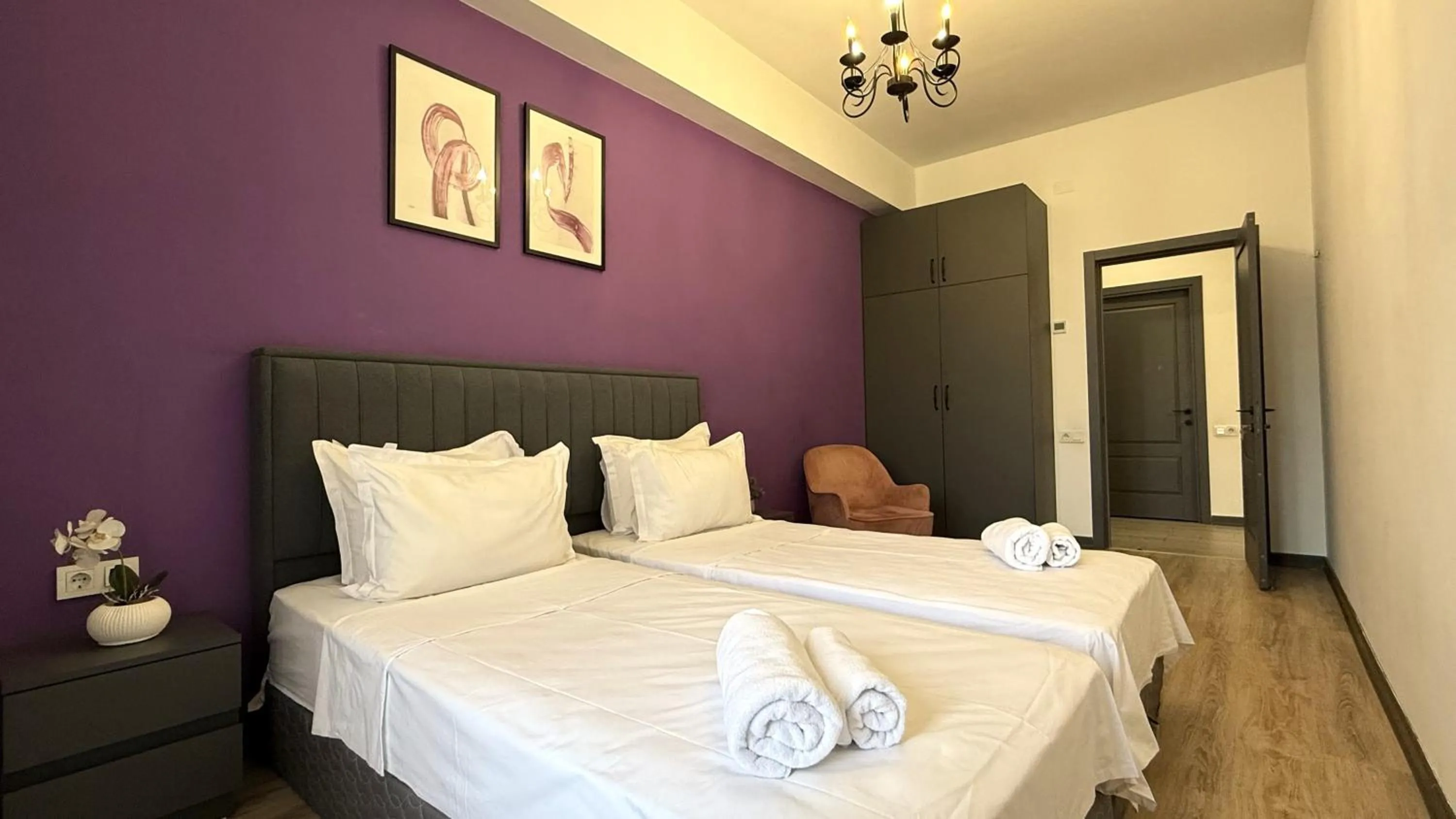 Bed in Sweet Home Deluxe Apart-Hotel