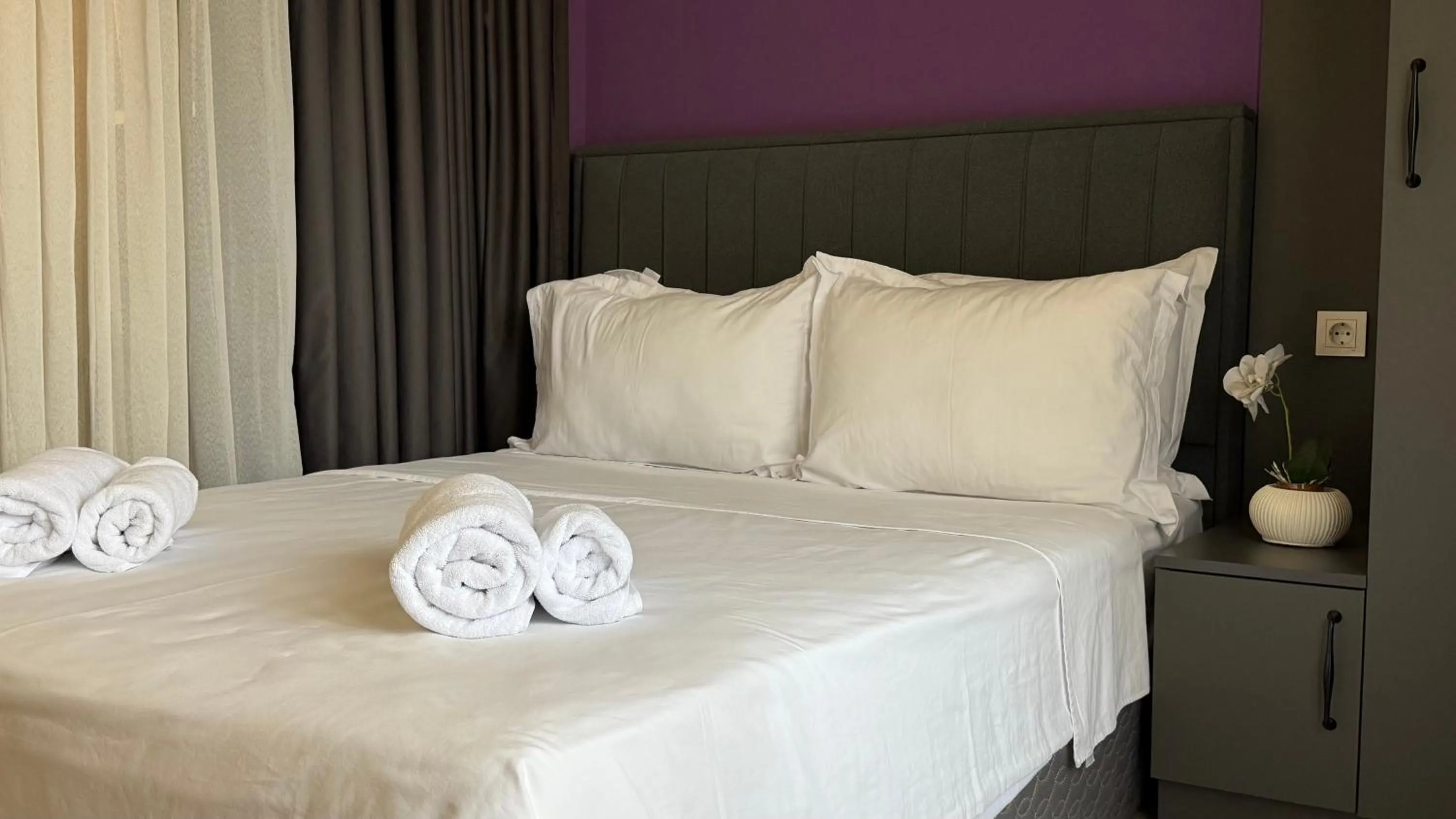 Bed in Sweet Home Deluxe Apart-Hotel