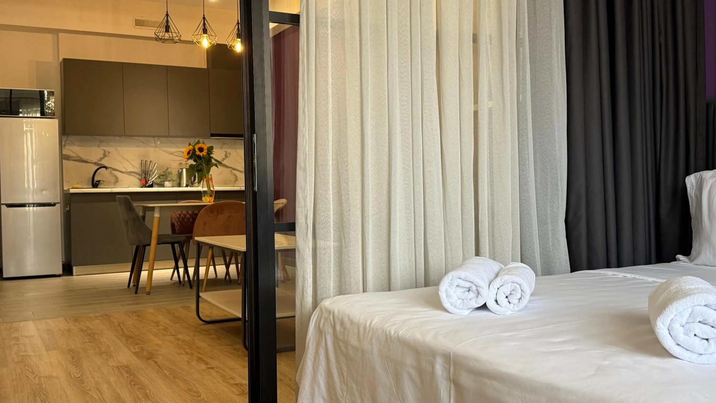 Bed in Sweet Home Deluxe Apart-Hotel