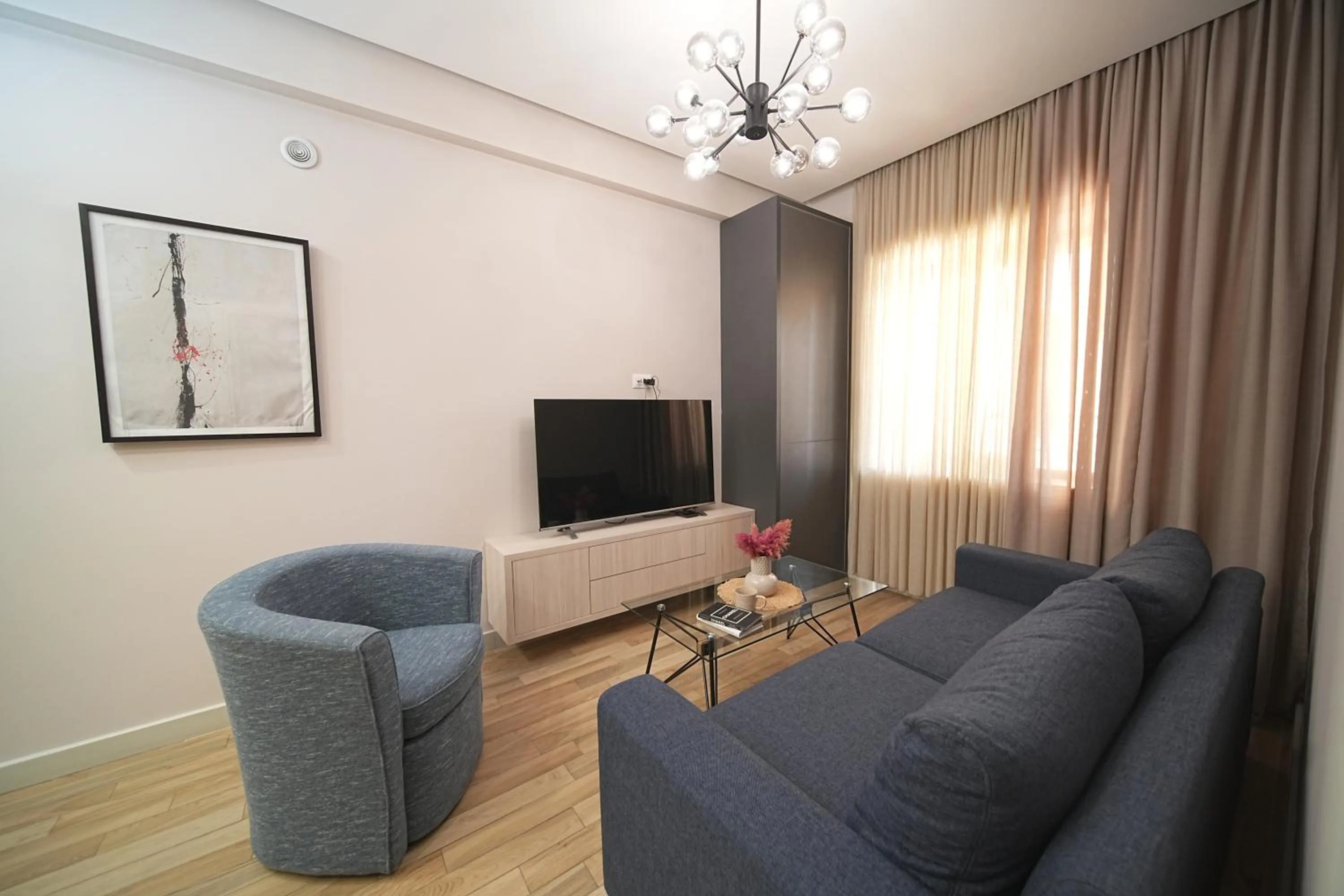 TV and multimedia in Sweet Home Deluxe Apart-Hotel