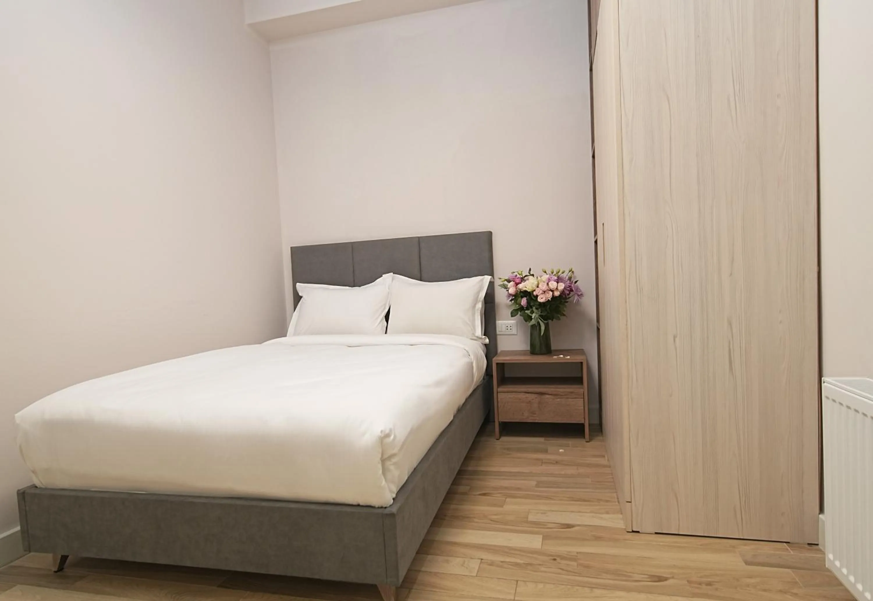 Bed in Sweet Home Deluxe Apart-Hotel