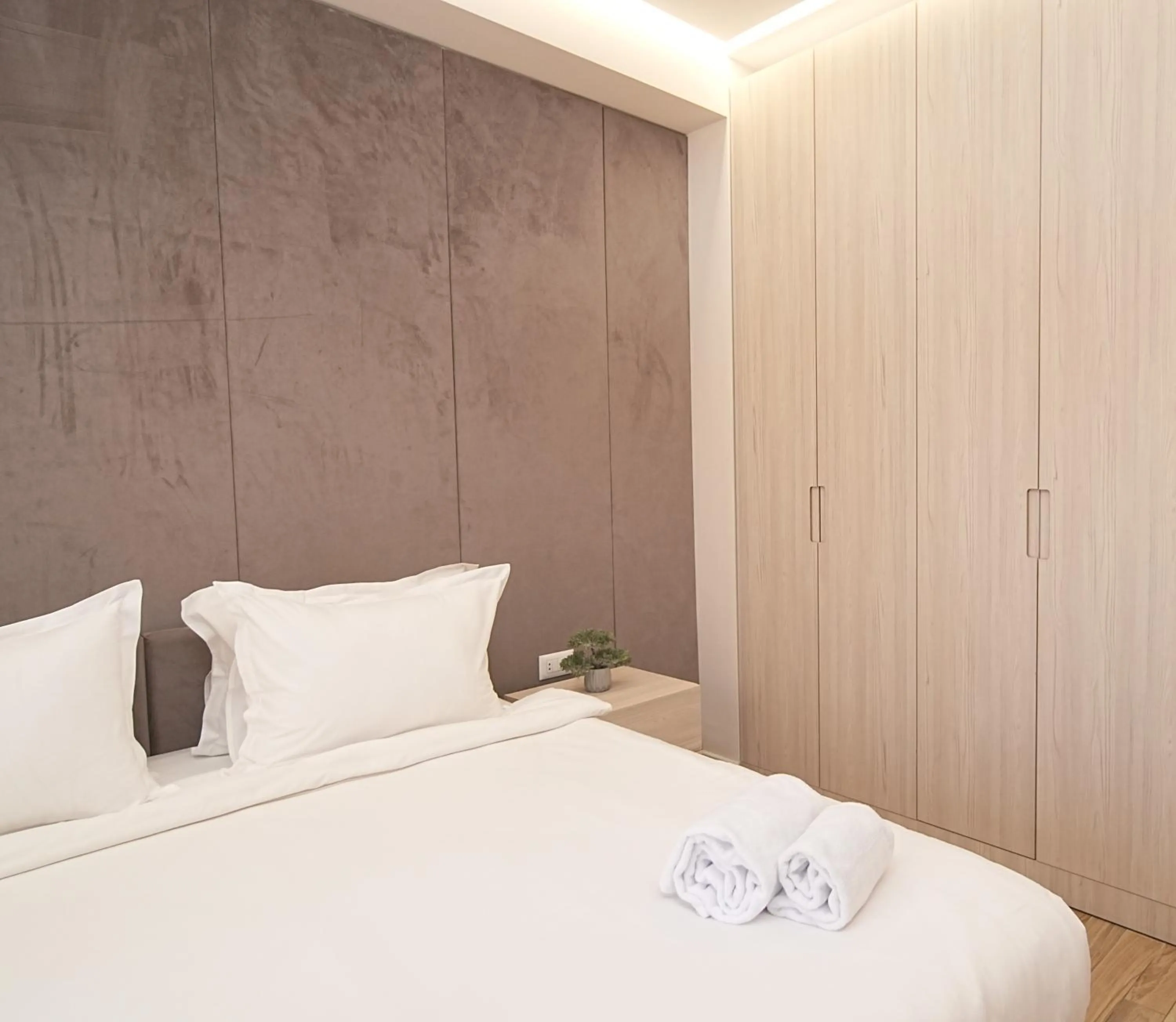 Bed in Sweet Home Deluxe Apart-Hotel