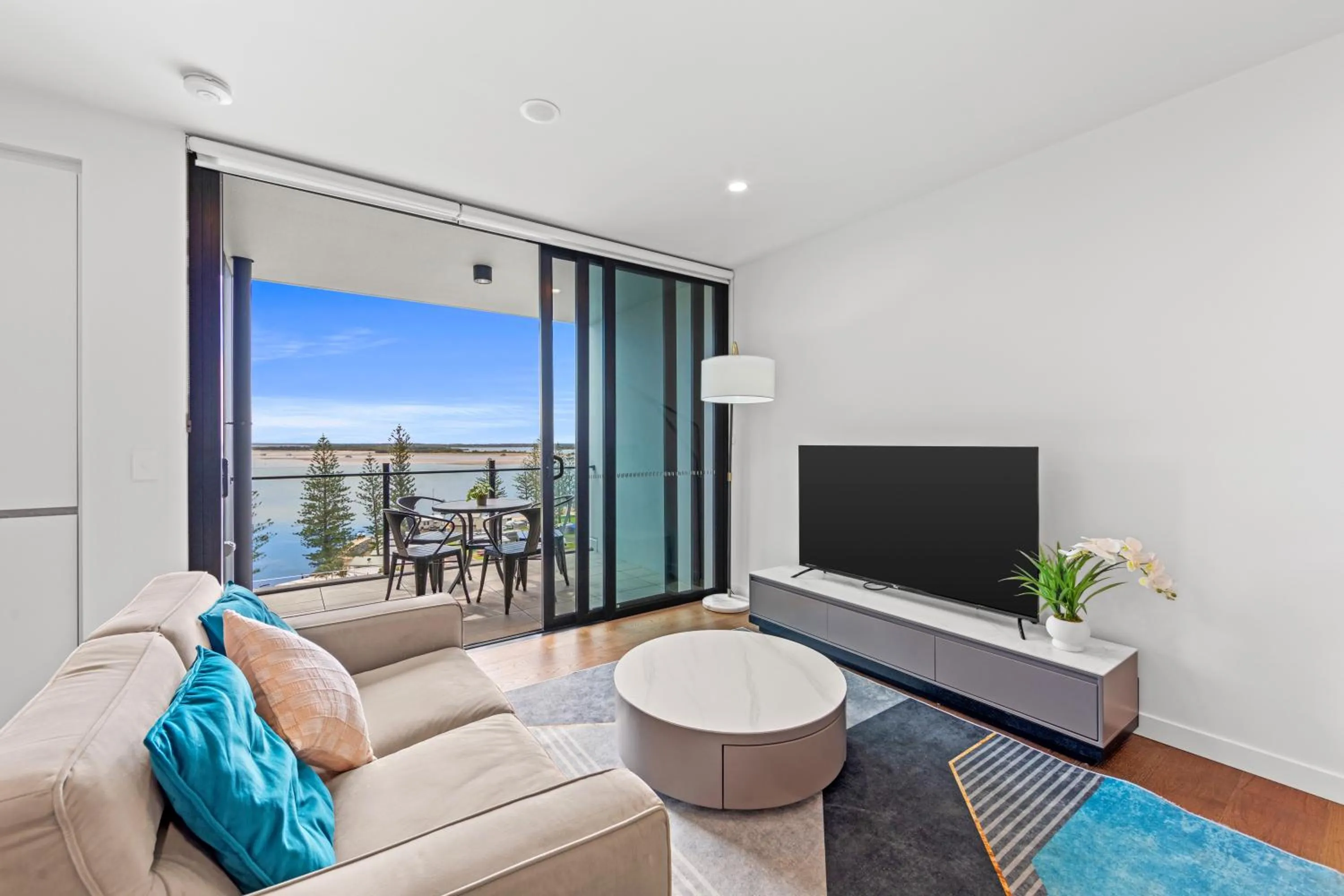 Living room in Marine Quarter Apartments by CLLIX