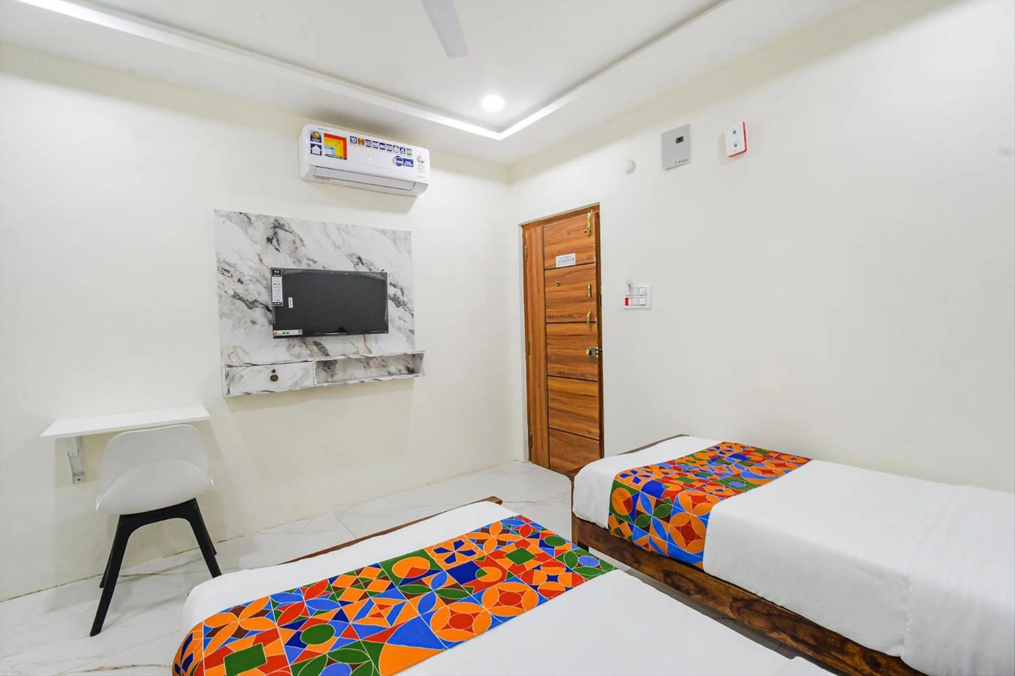 Bed in FabHotel SSR Ikon Suites - Nr Hyderabad Central University, Kondapur
