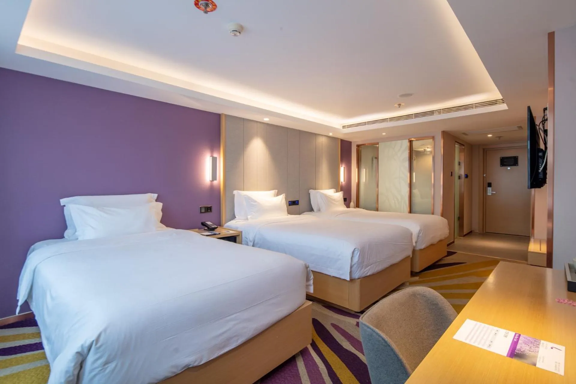 Bed in Lavande Hotel Beijing Tiananmen Square Wangfujing Street Branch