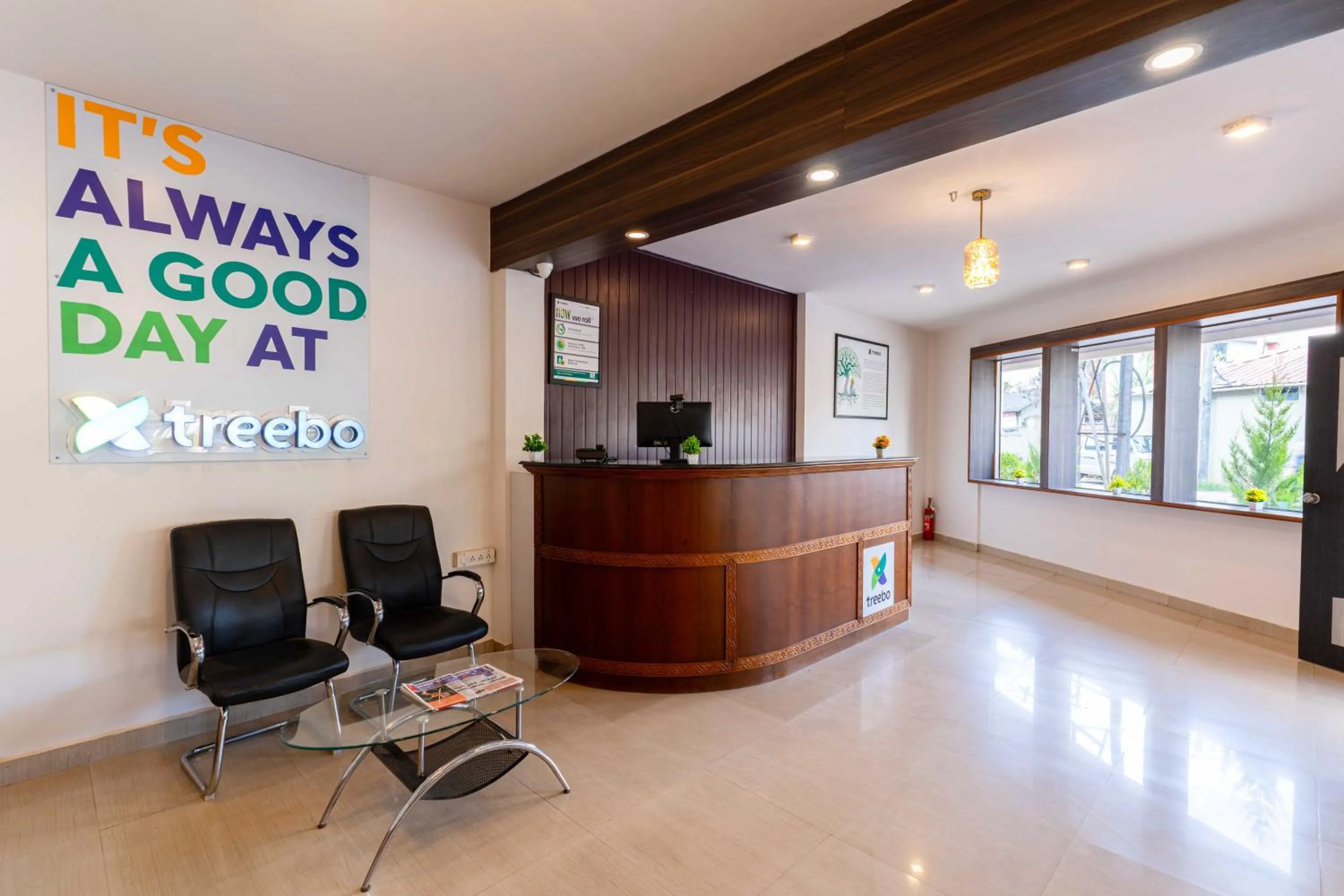 Lobby or reception in Treebo Regalia Comforts, 15 Mins From Abbey Waterfall