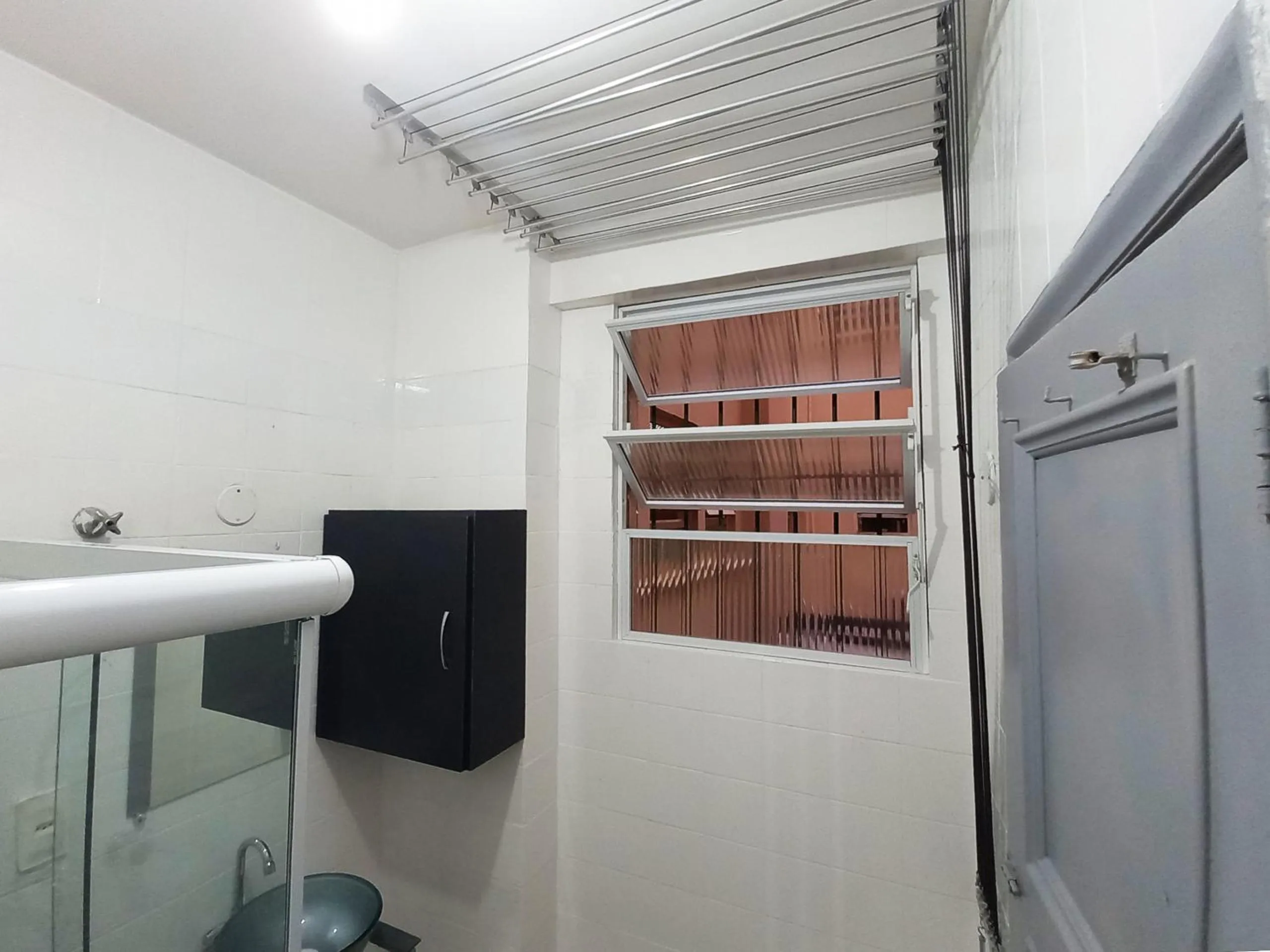 Studio na Praia de Copacabana, maquina de lavar