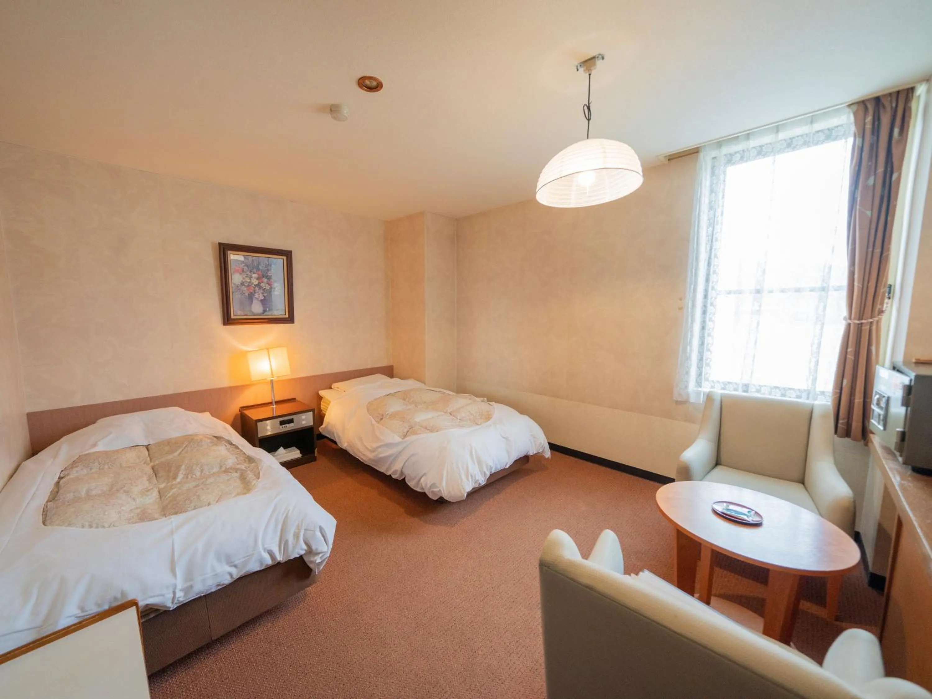 Photo of the whole room, Bed in Kawayu Kanko Hotel