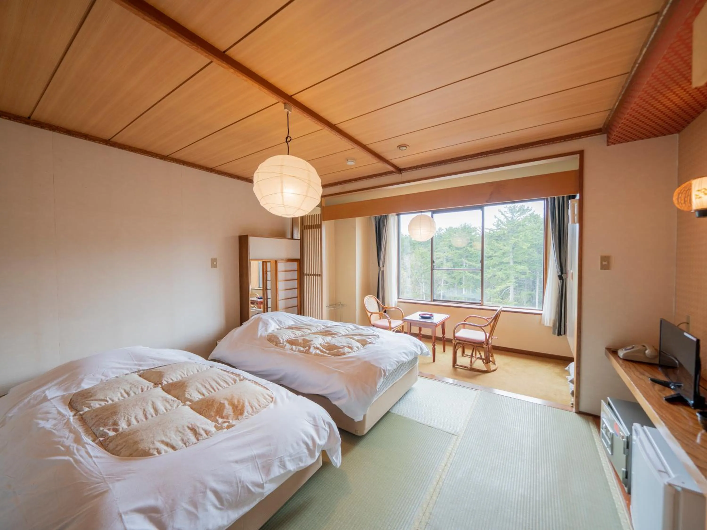 Photo of the whole room, Bed in Kawayu Kanko Hotel