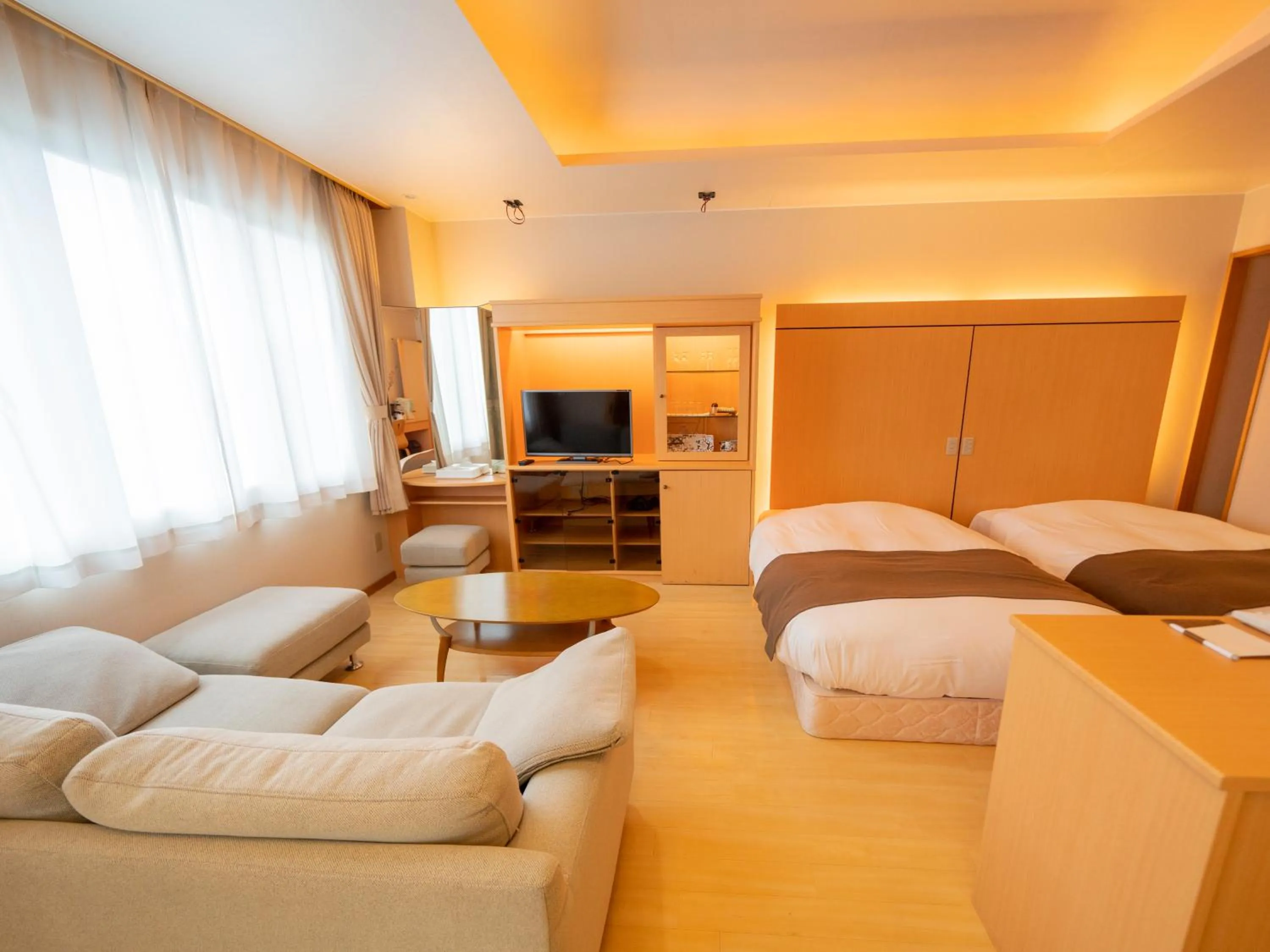 Photo of the whole room, Bed in Kawayu Kanko Hotel