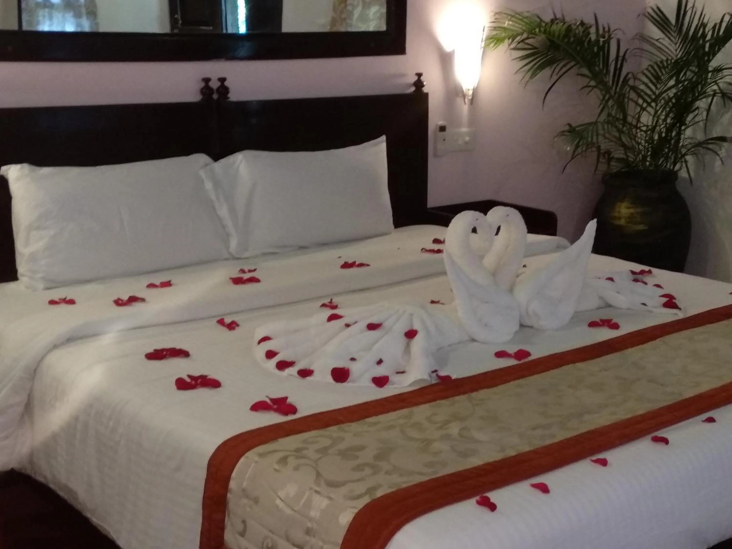 Bed in Marari Umapathi Beach Villa