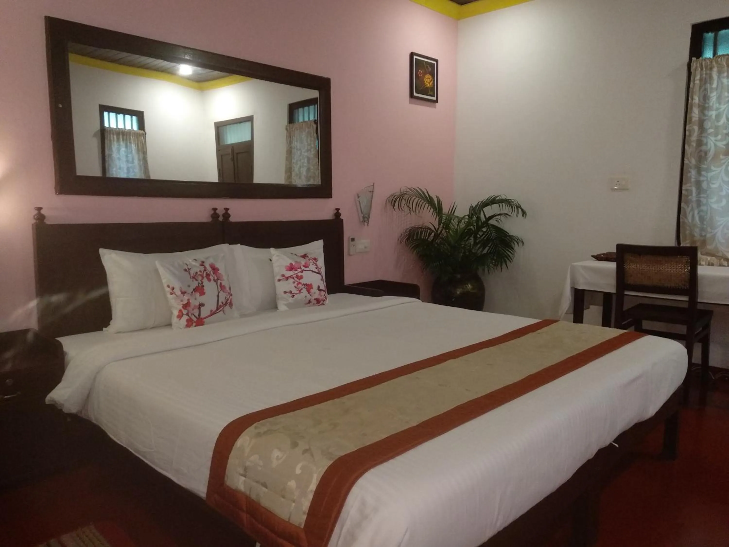 Bed in Marari Umapathi Beach Villa