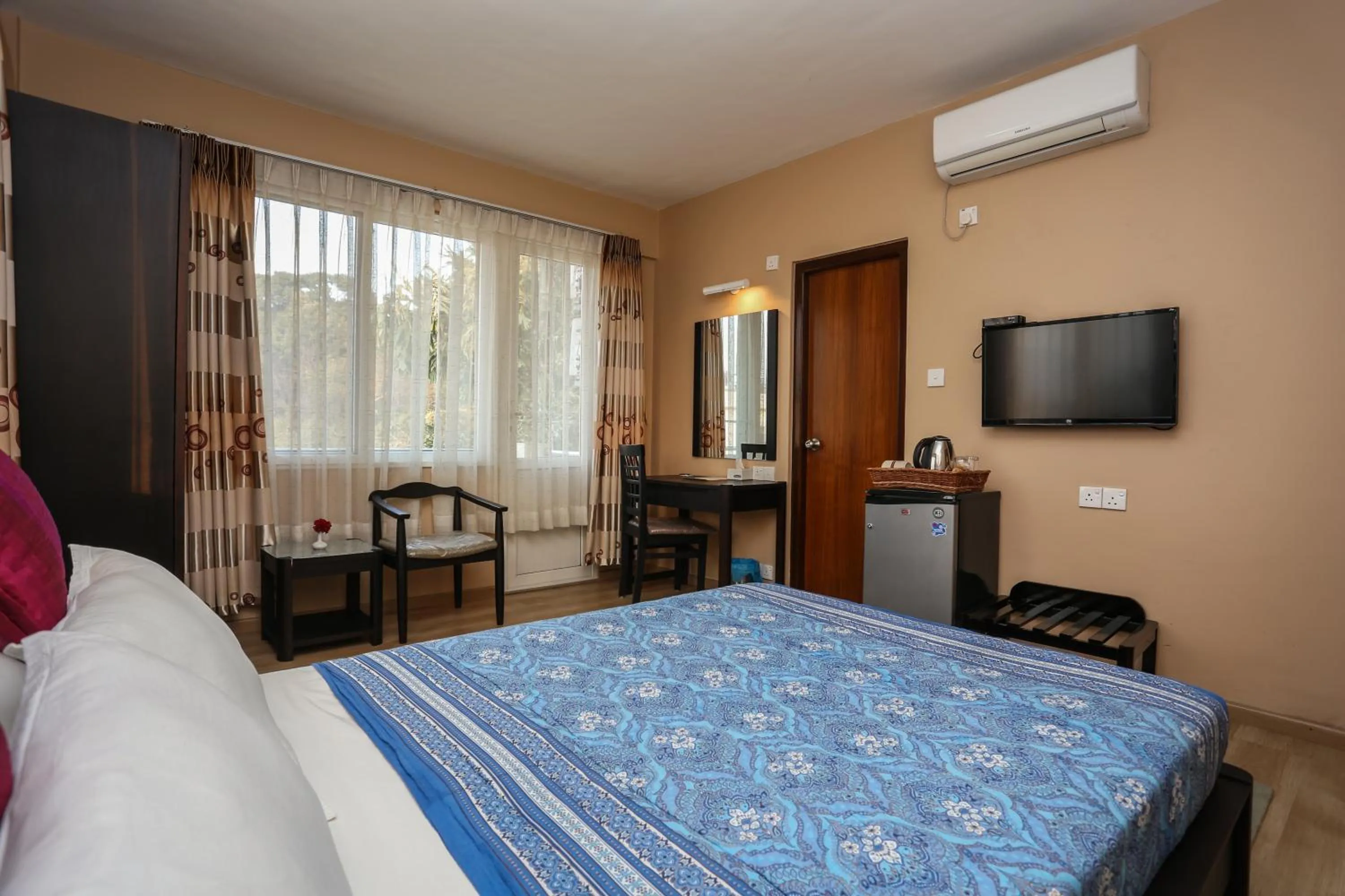 Photo of the whole room, Bed in Nirvana Home