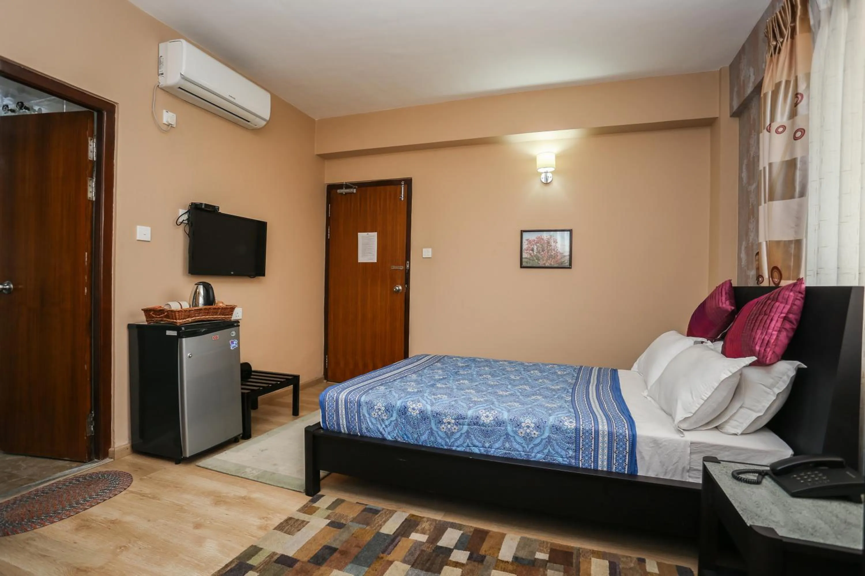 Photo of the whole room, Bed in Nirvana Home