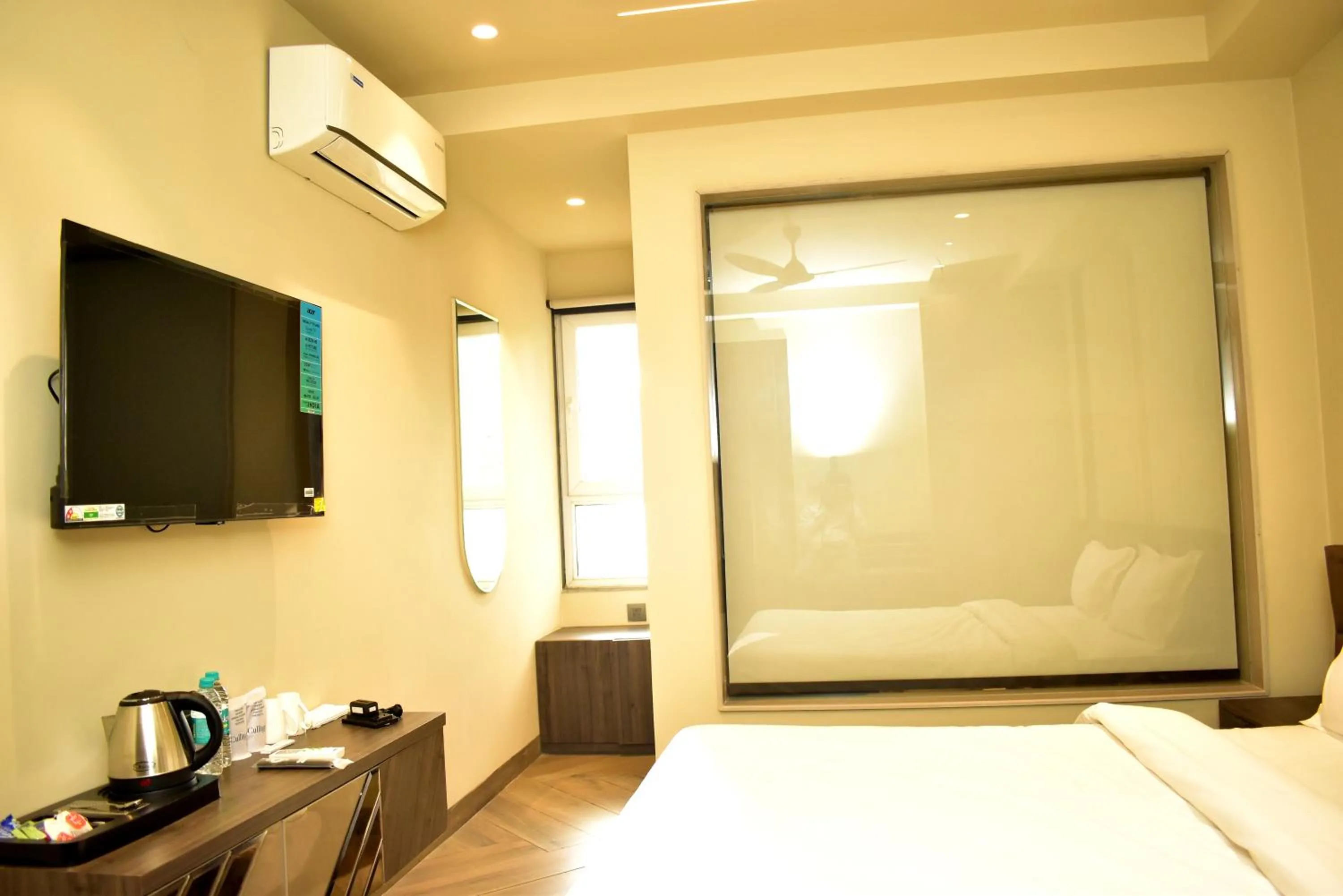 Bed in Qotel Signature Coleman Janakpuri