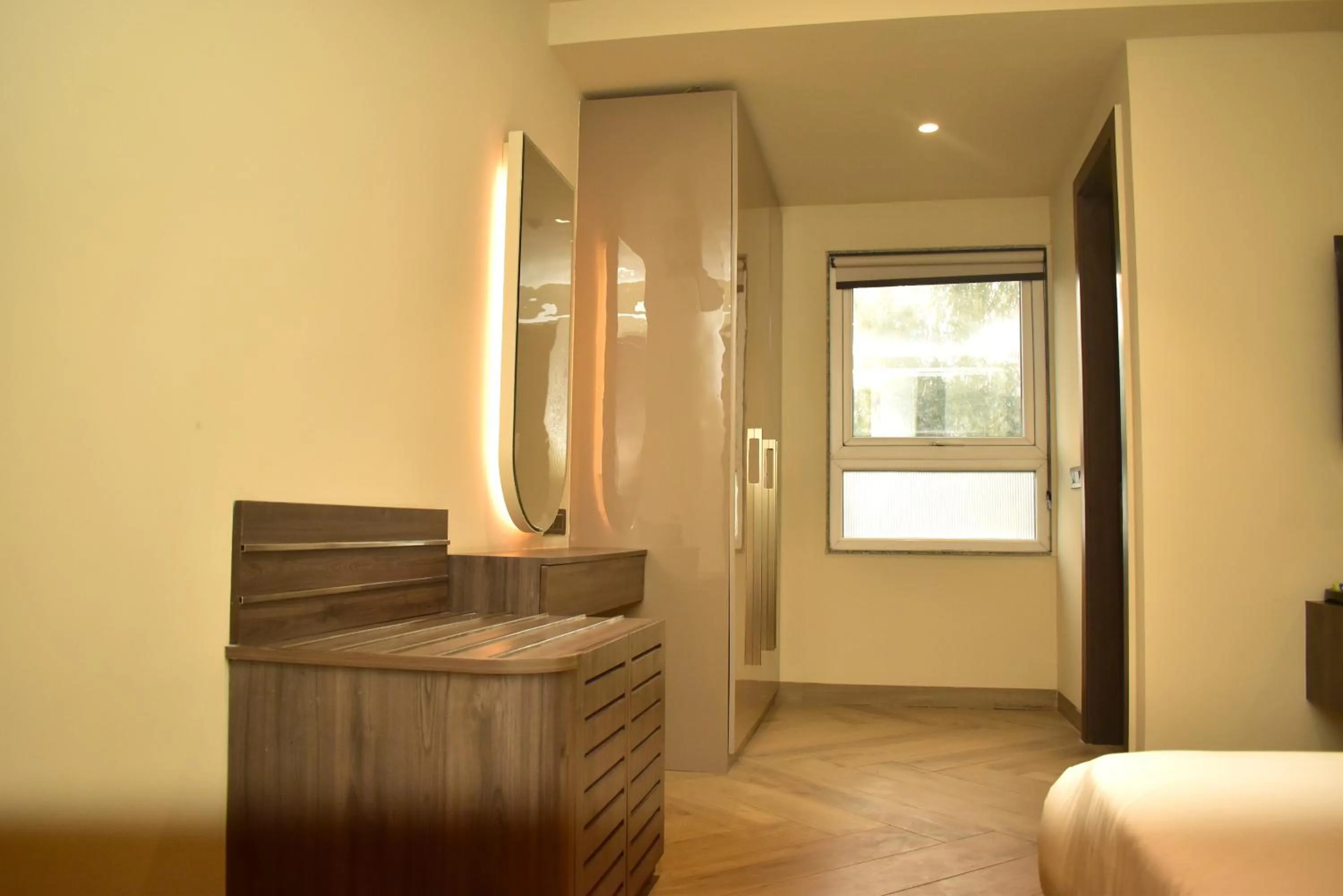 Bed in Qotel Signature Coleman Janakpuri