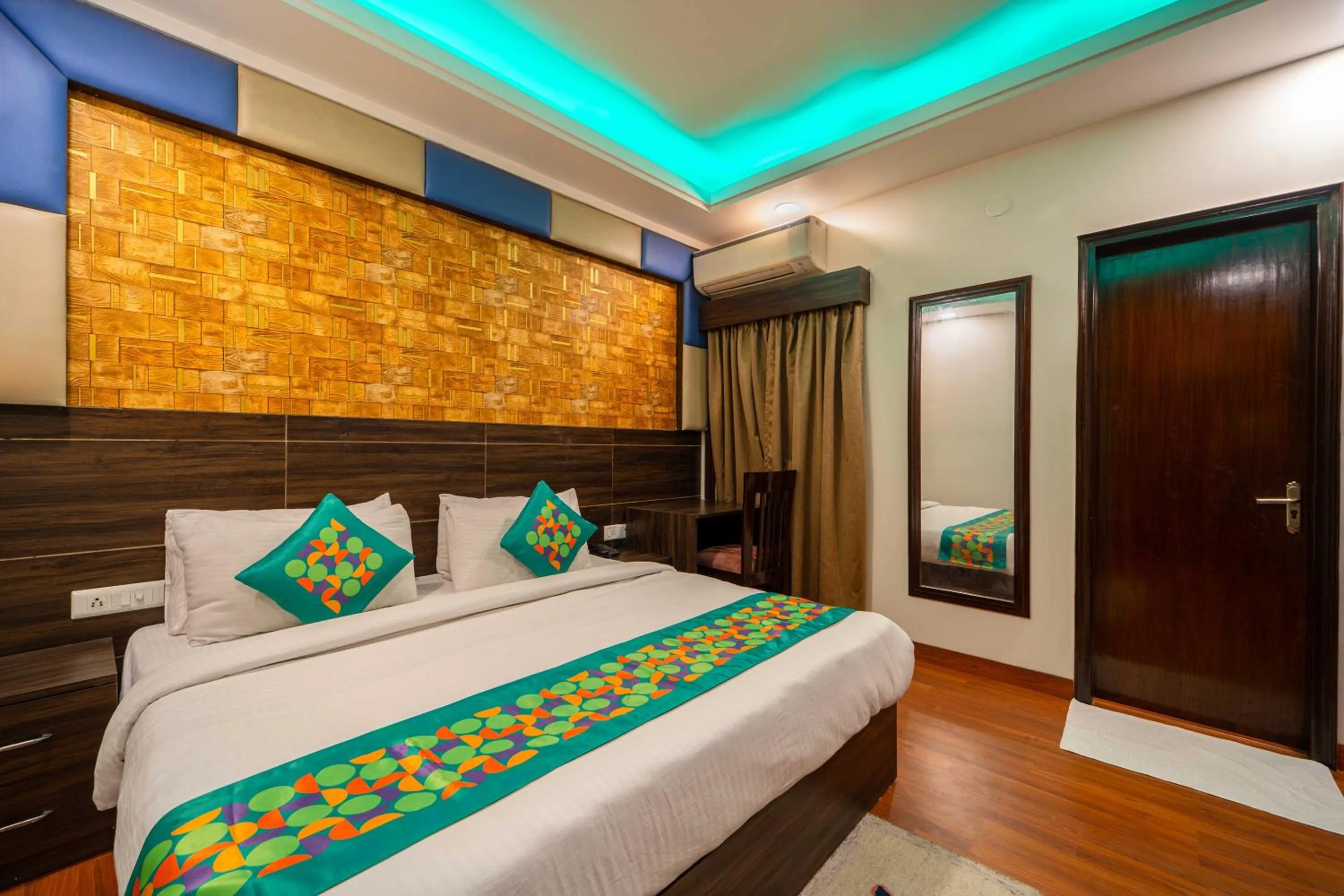 Bedroom, Bed in Treebo Marigold