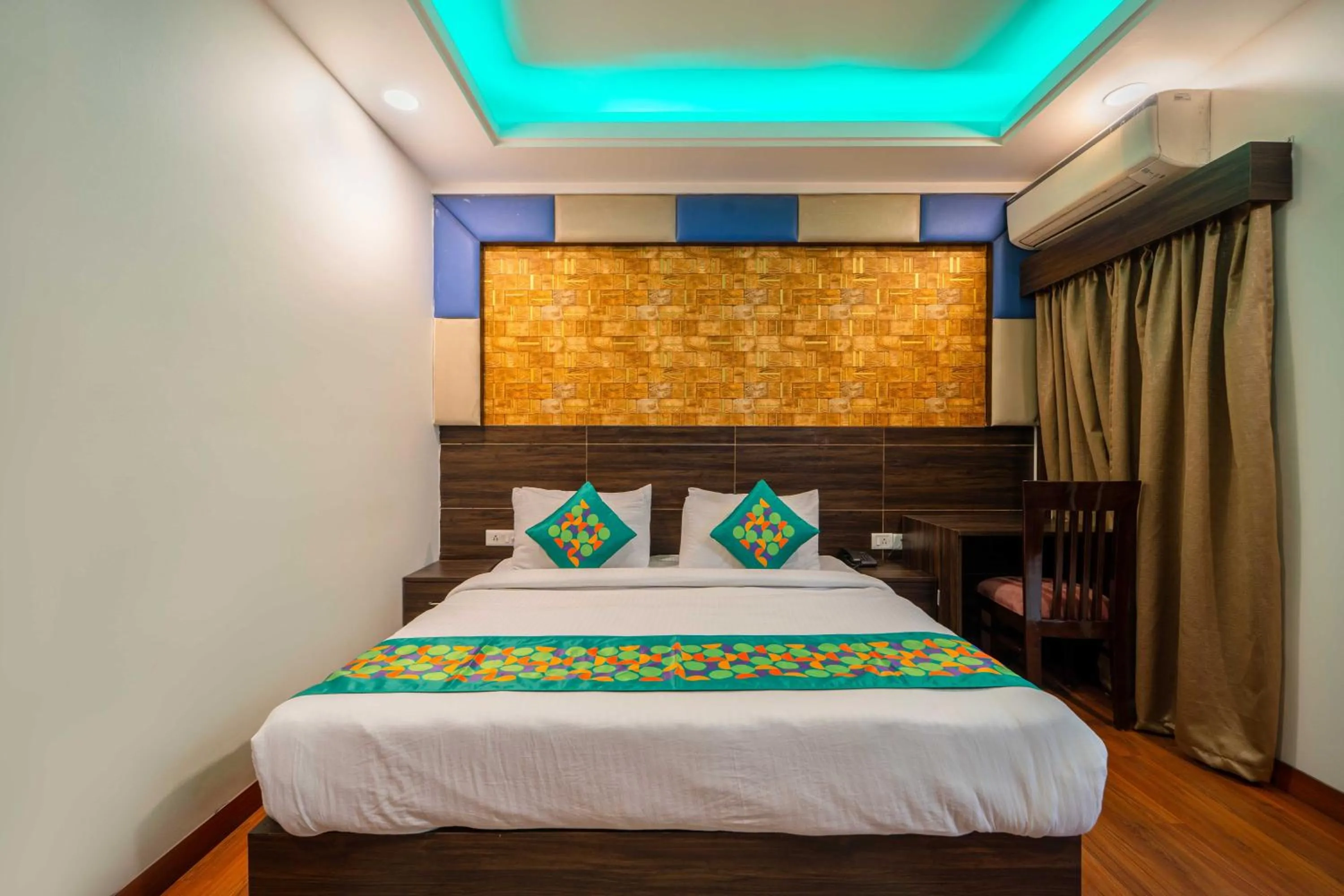 Bedroom, Bed in Treebo Marigold