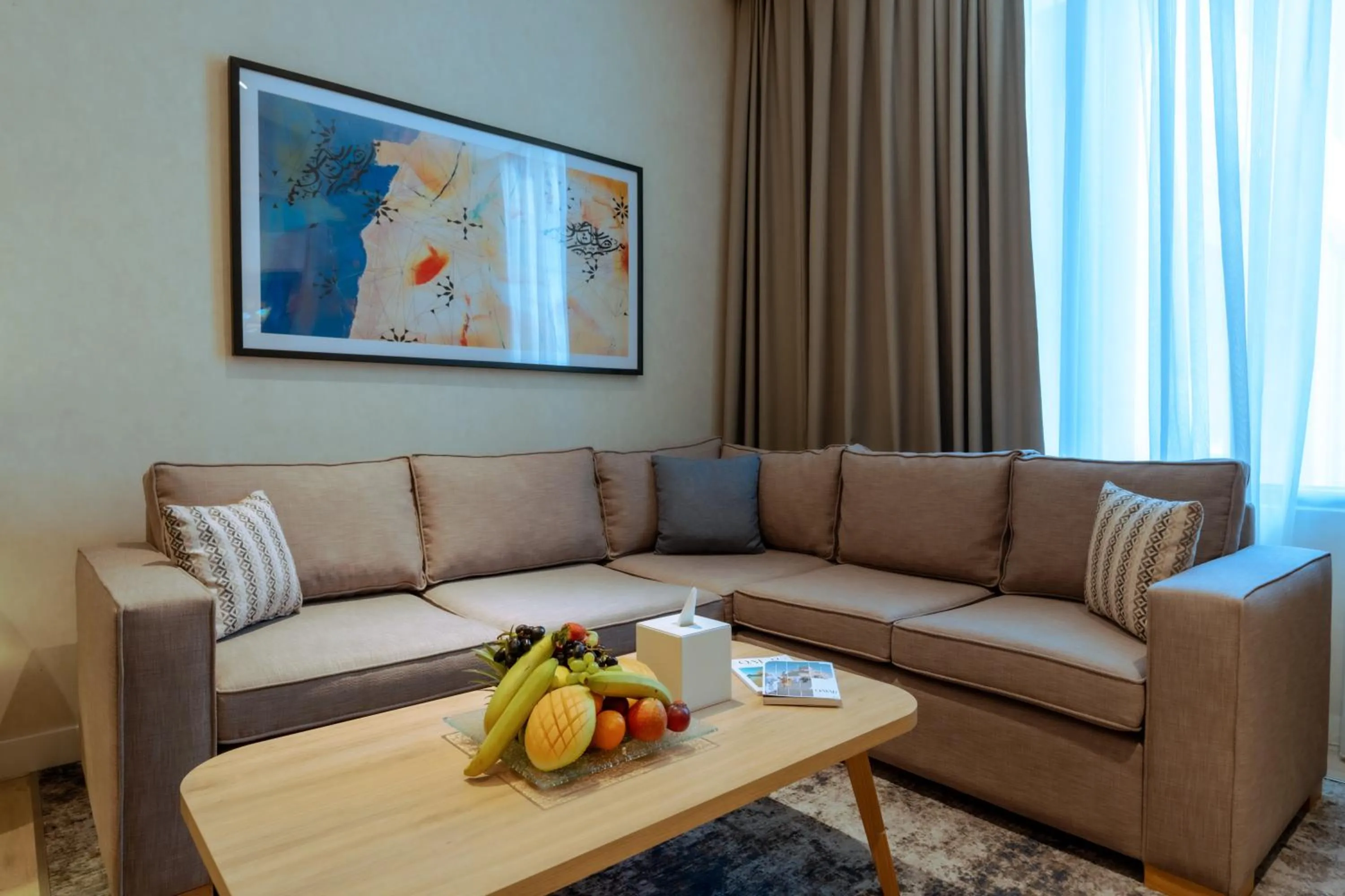 Living room in West Walk Retaj Hotel
