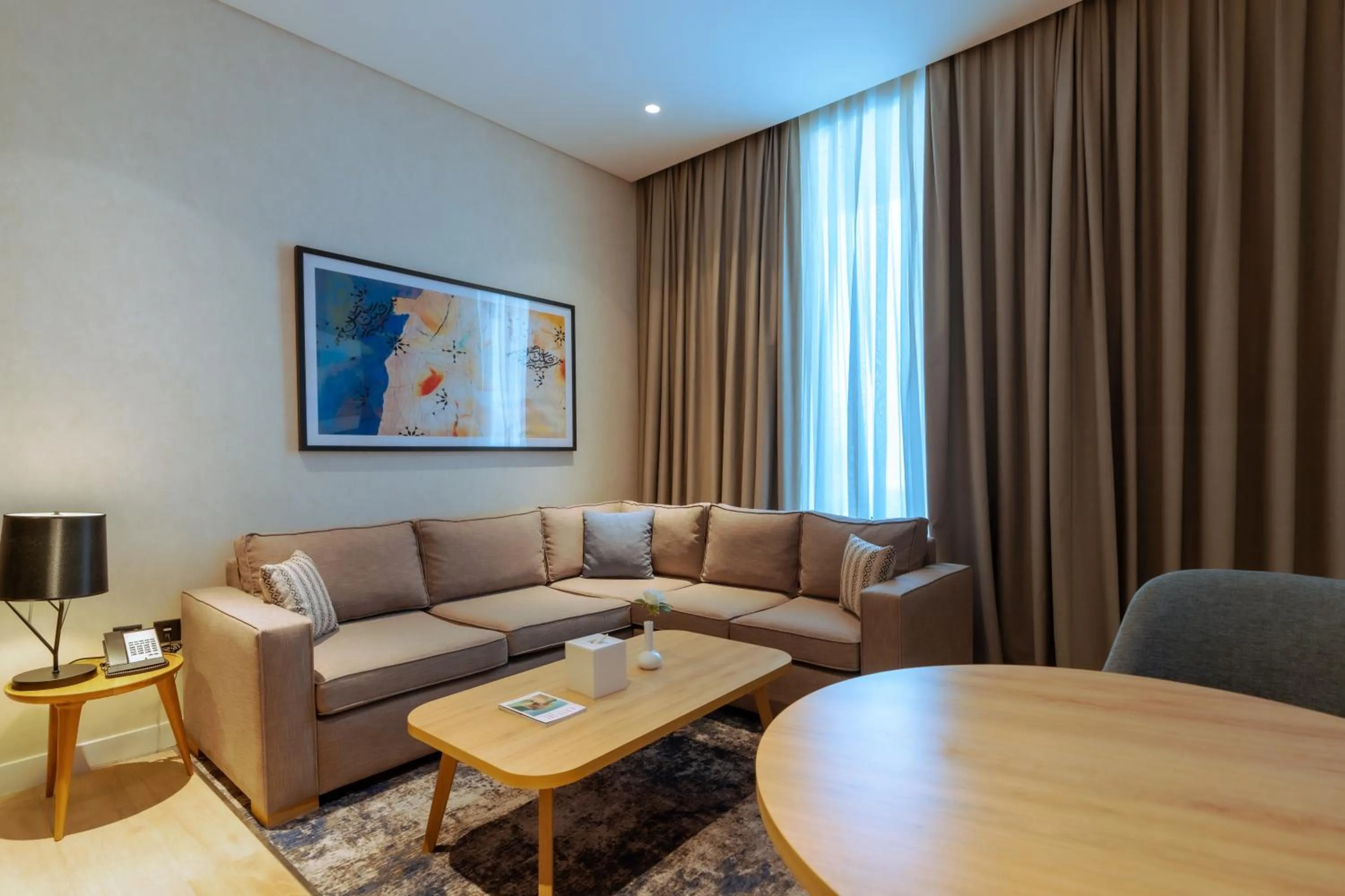 Living room in West Walk Retaj Hotel