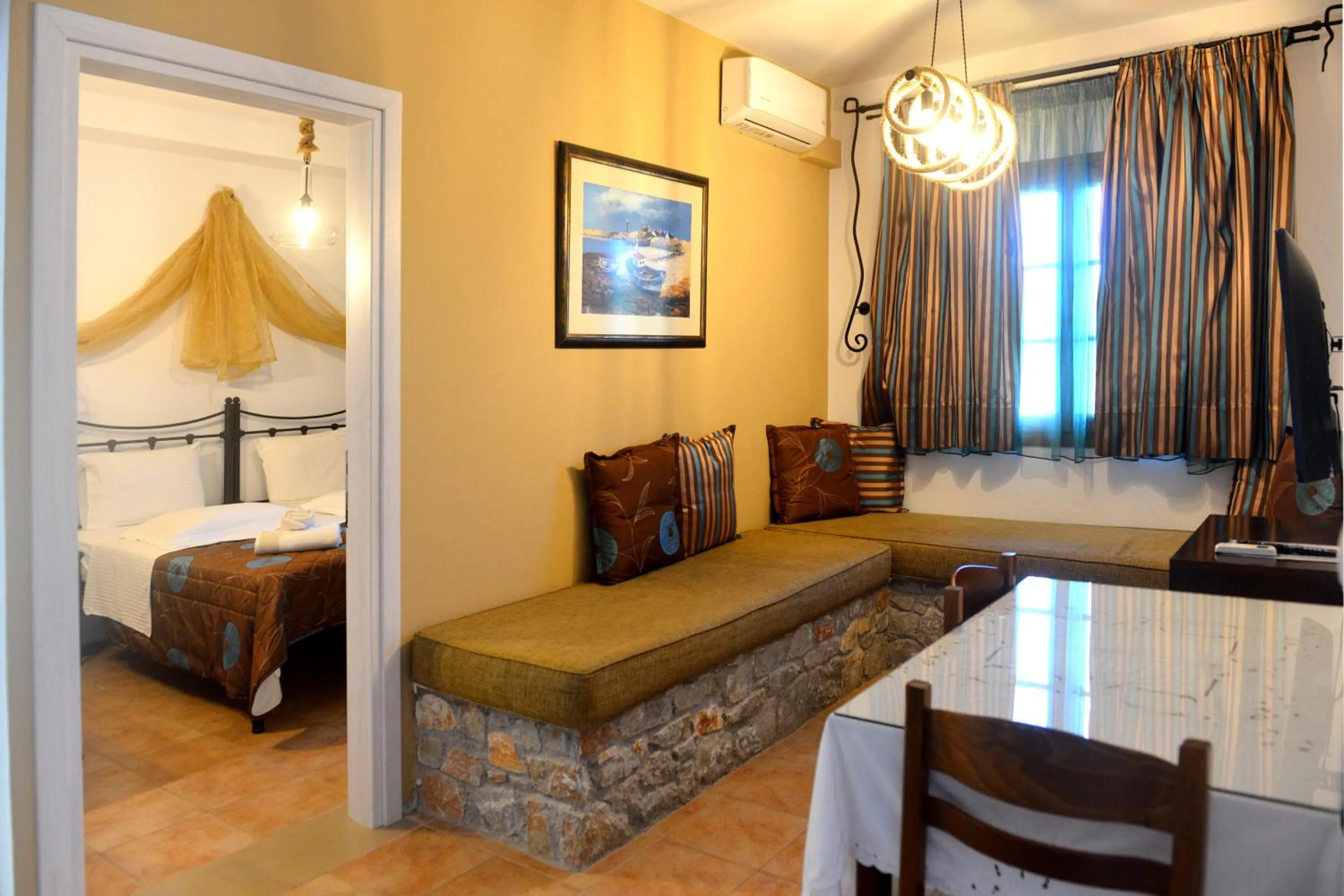 Bed in Skiathos Island Suites