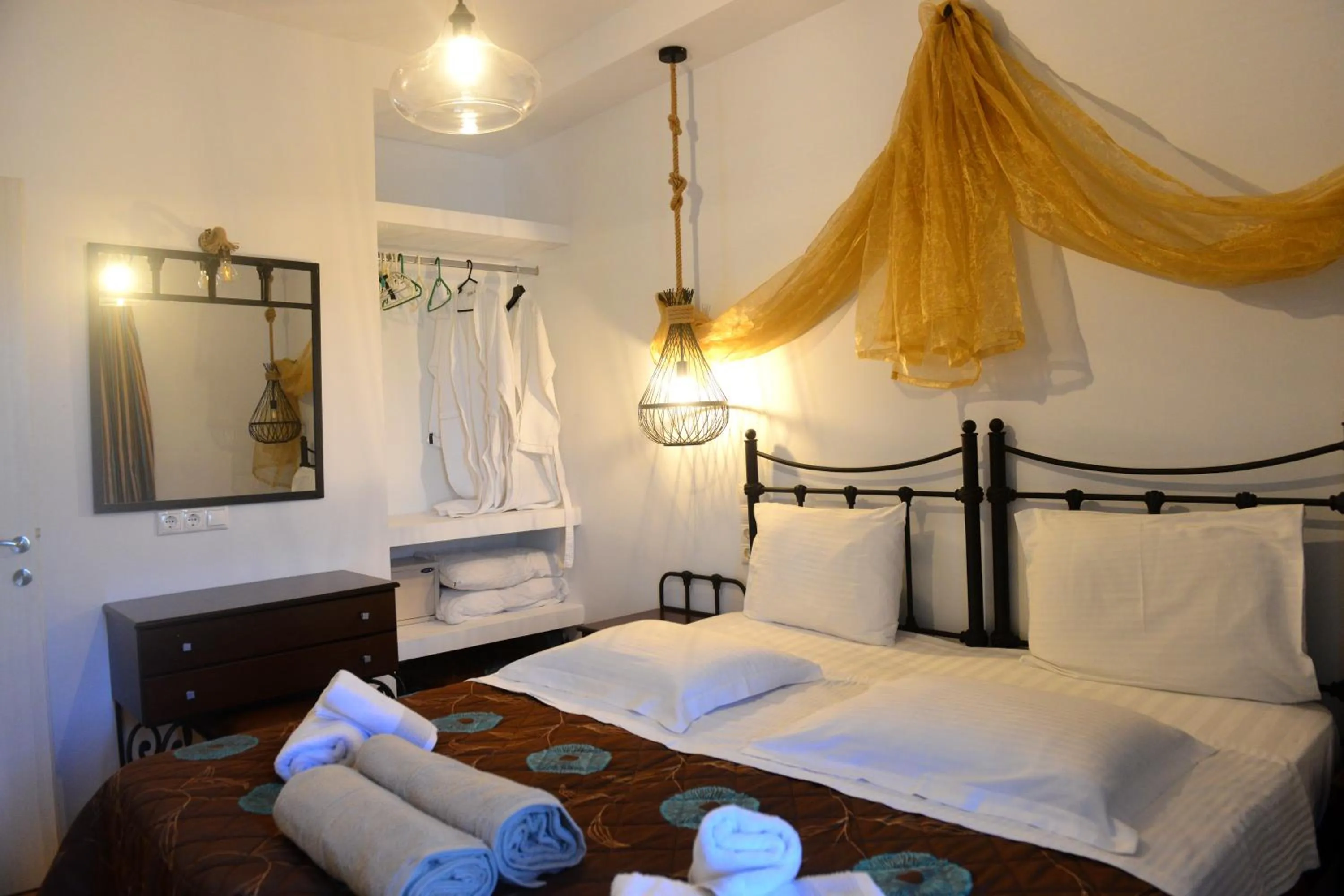 Bed in Skiathos Island Suites