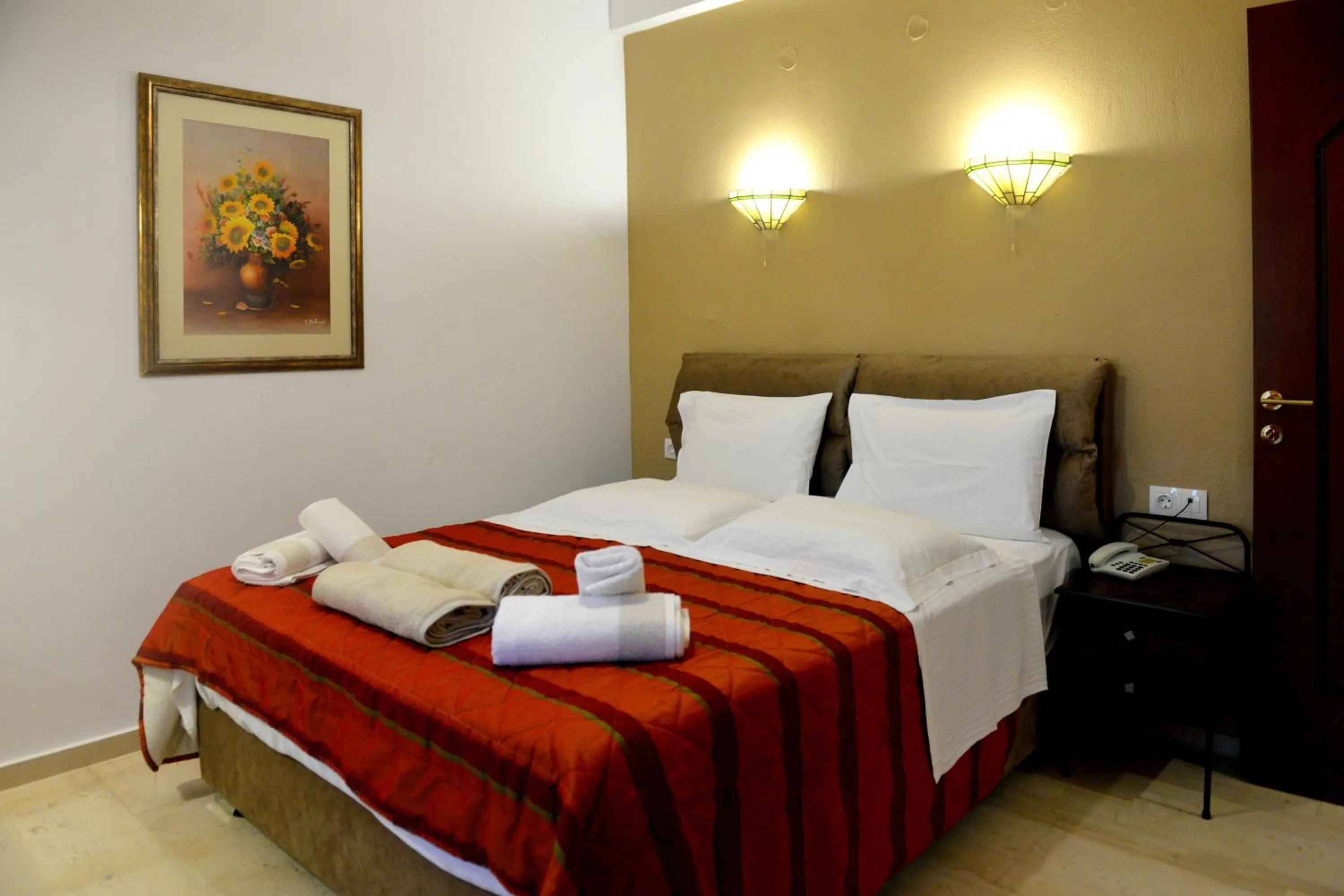 Bed in Skiathos Island Suites