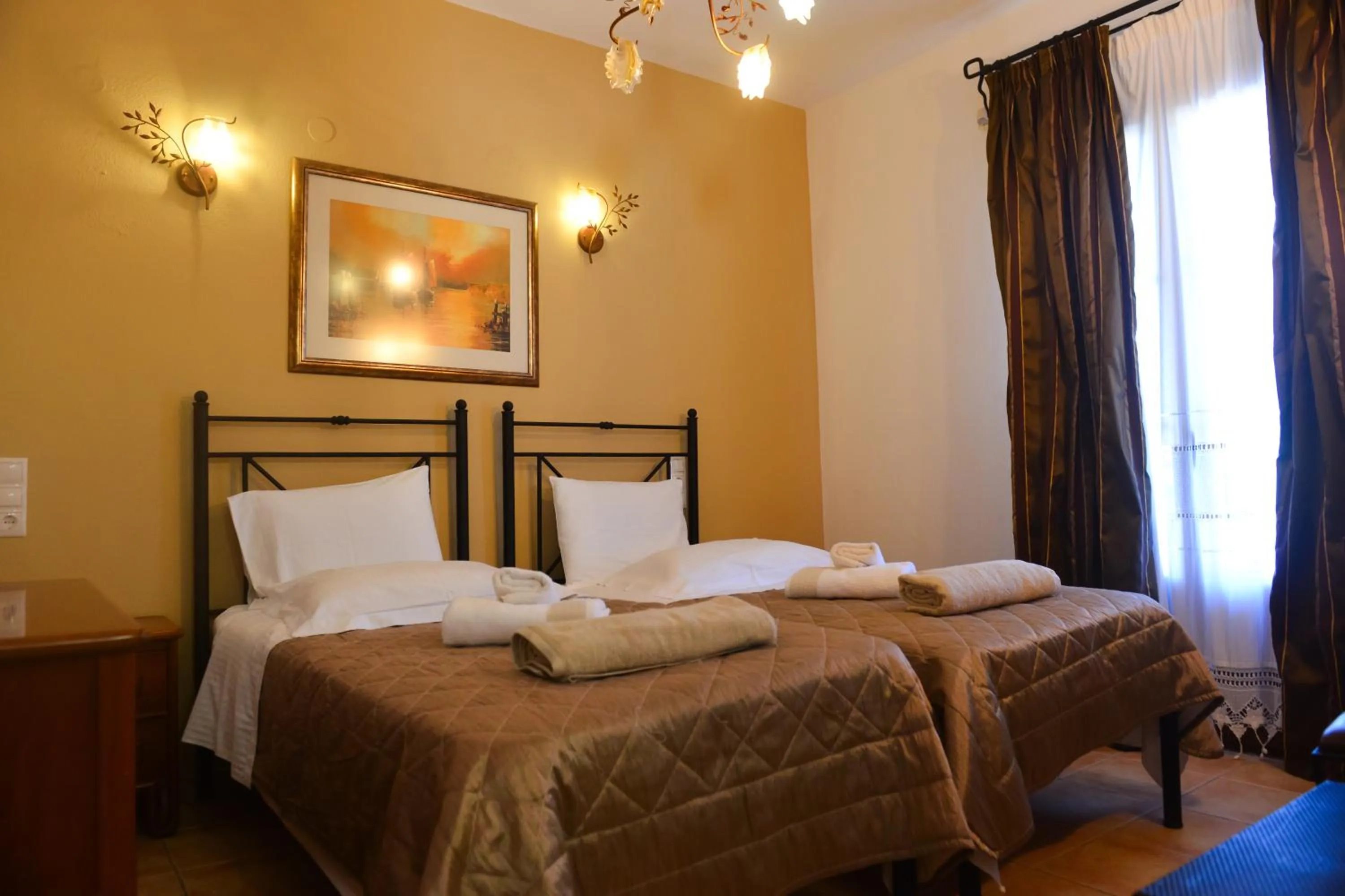 Bed in Skiathos Island Suites