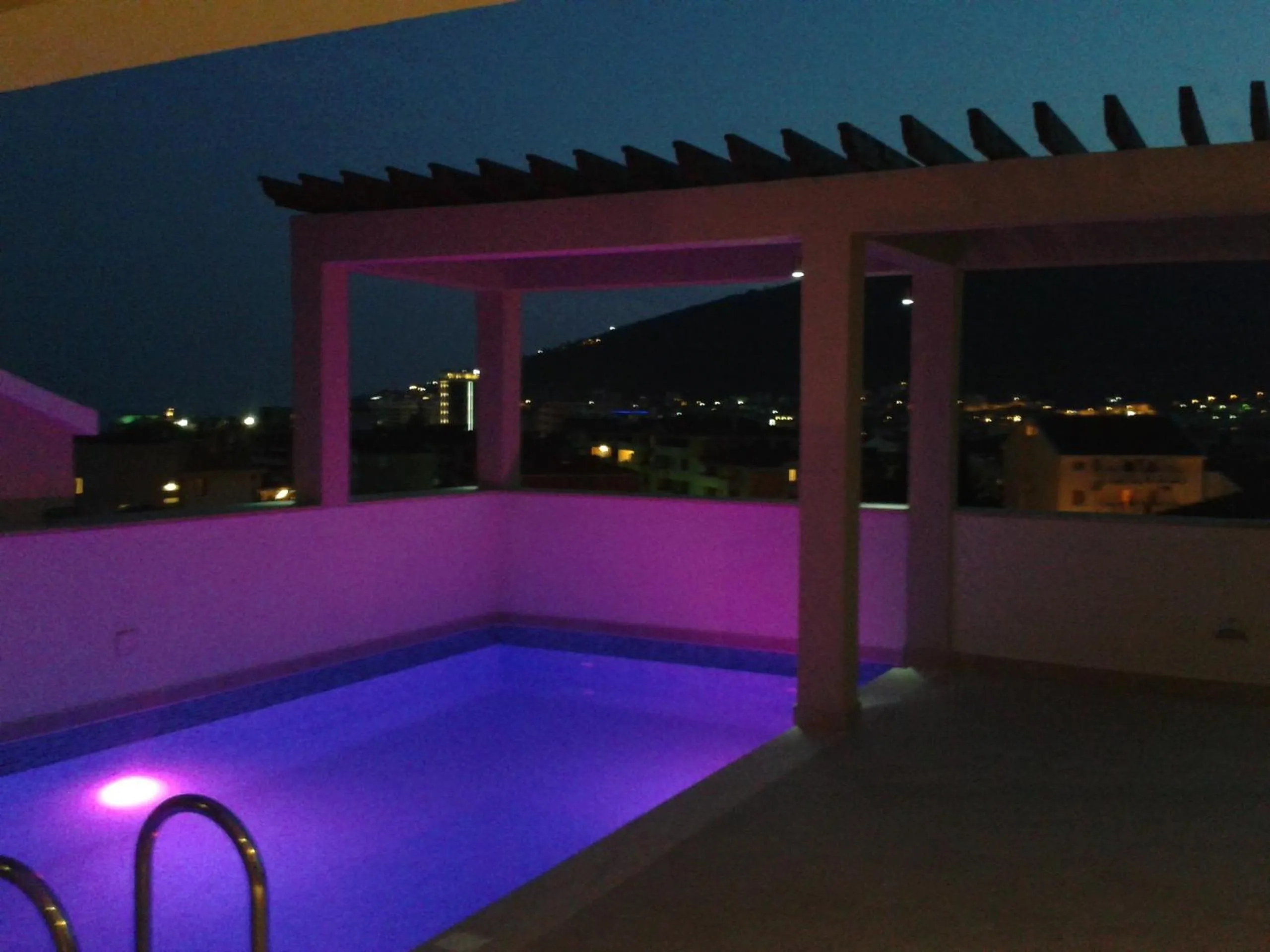 Swimming pool in Apartments and Rooms Grand Palazzo