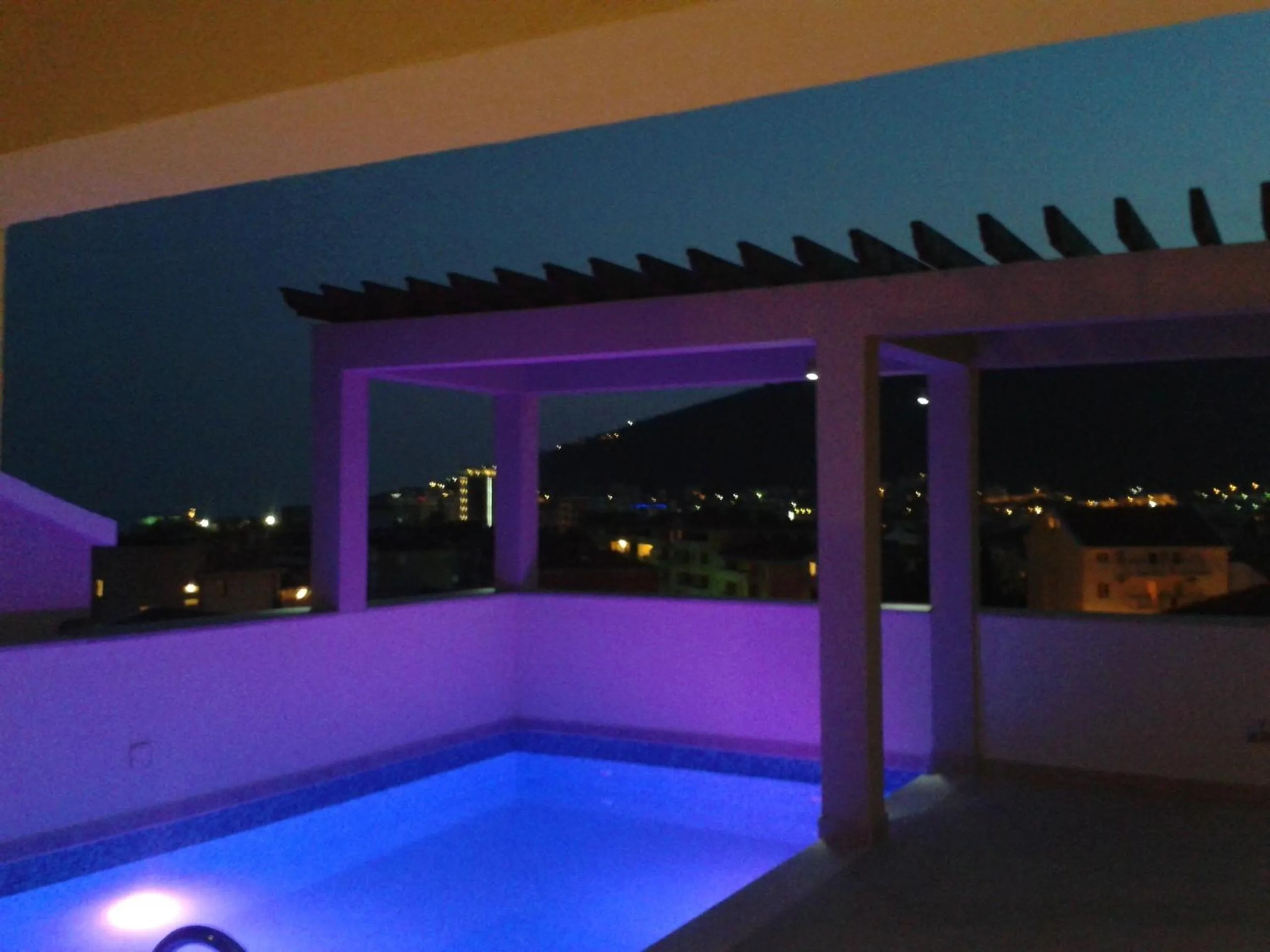 Swimming pool in Apartments and Rooms Grand Palazzo