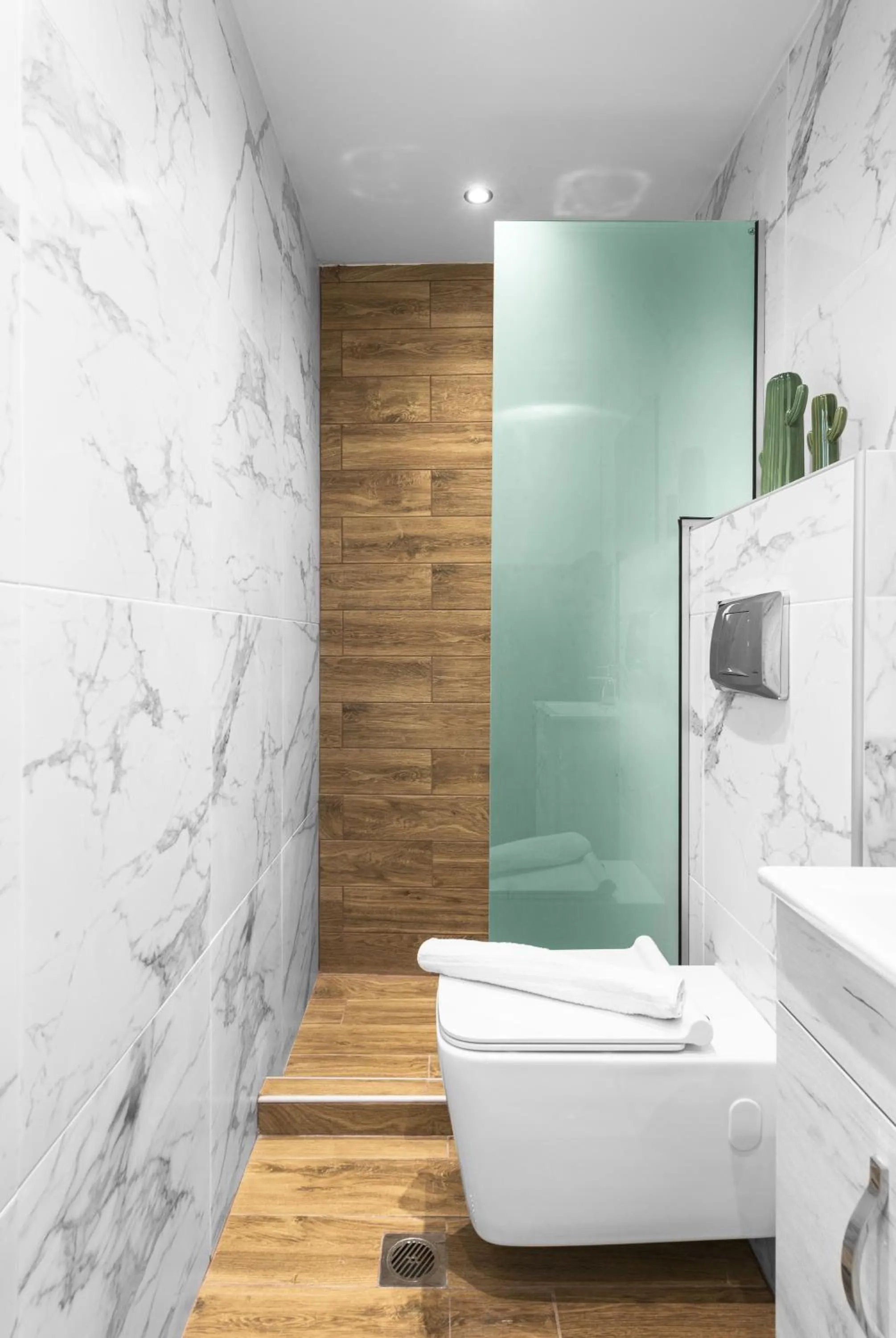 Shower in DeniZen Boutique Apartments, Nilie Hospitality MGMT