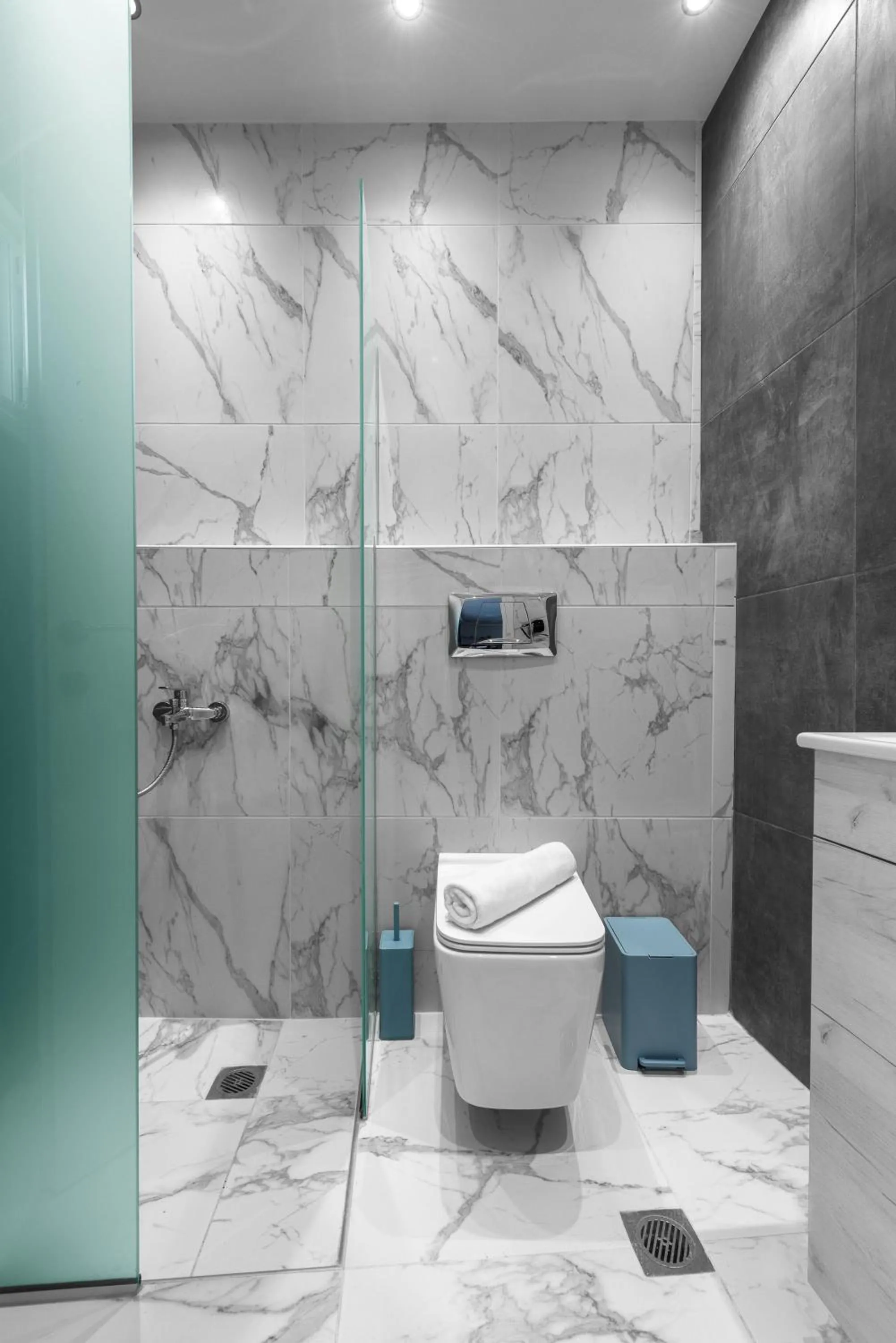 Shower in DeniZen Boutique Apartments, Nilie Hospitality MGMT