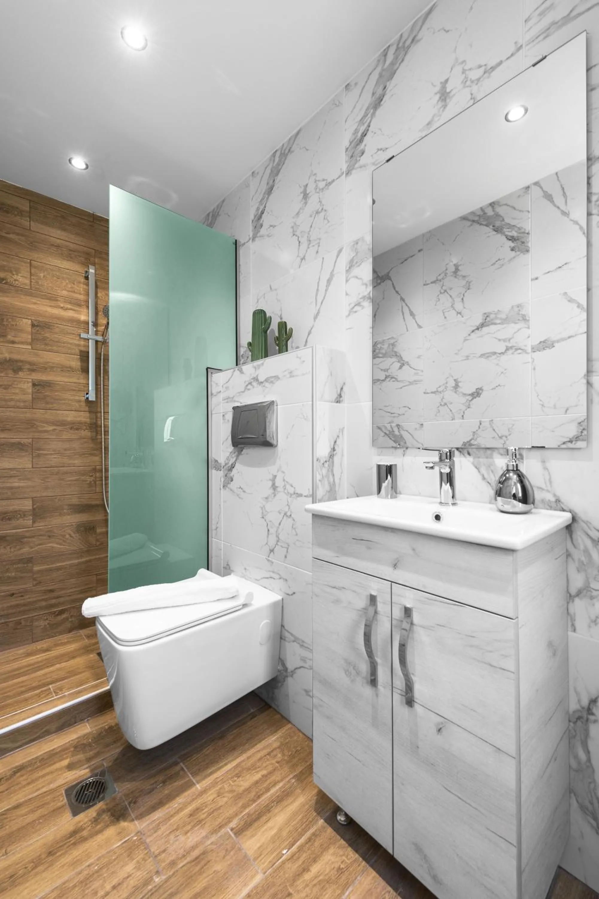 Shower in DeniZen Boutique Apartments, Nilie Hospitality MGMT