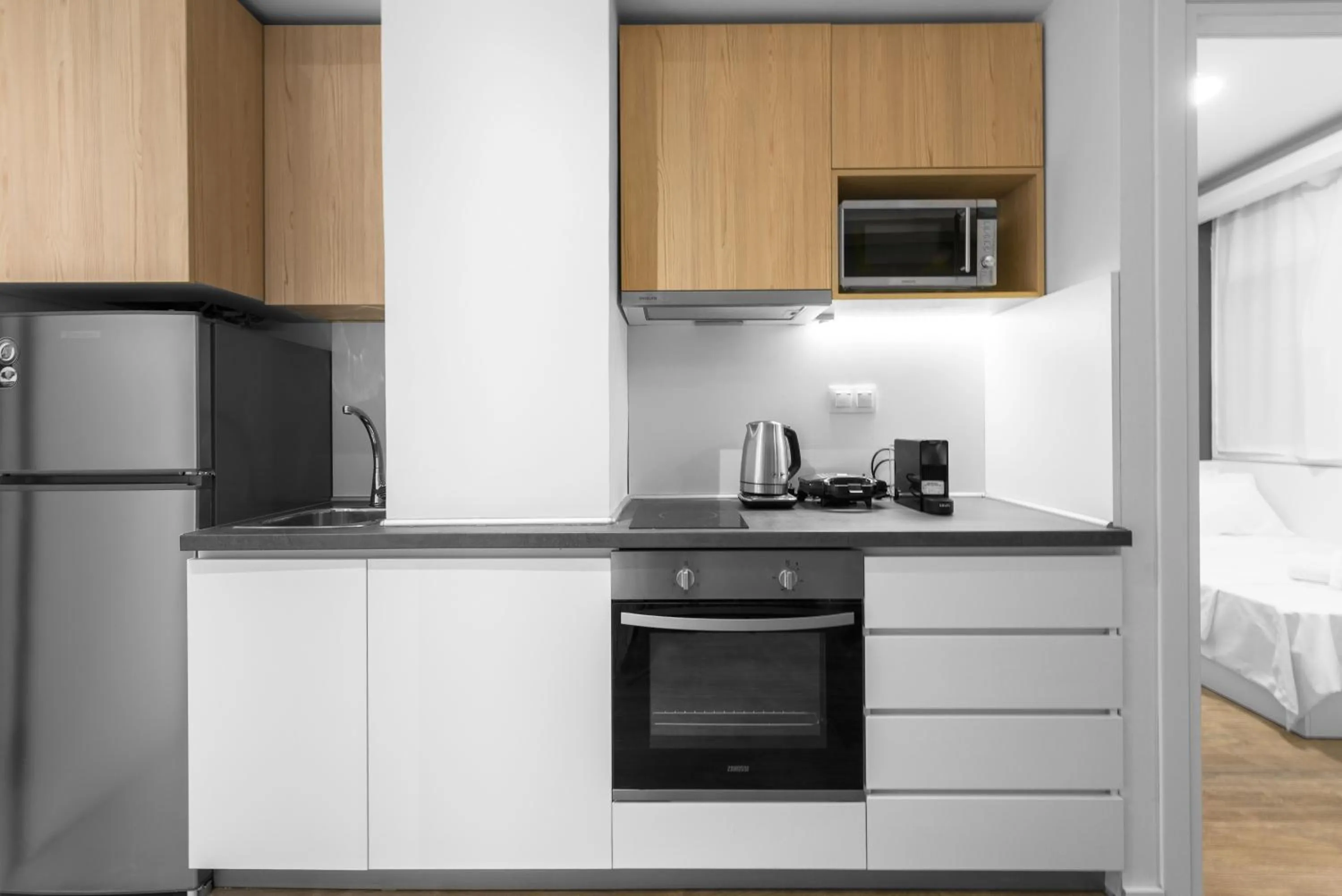 Kitchen or kitchenette in DeniZen Boutique Apartments, Nilie Hospitality MGMT