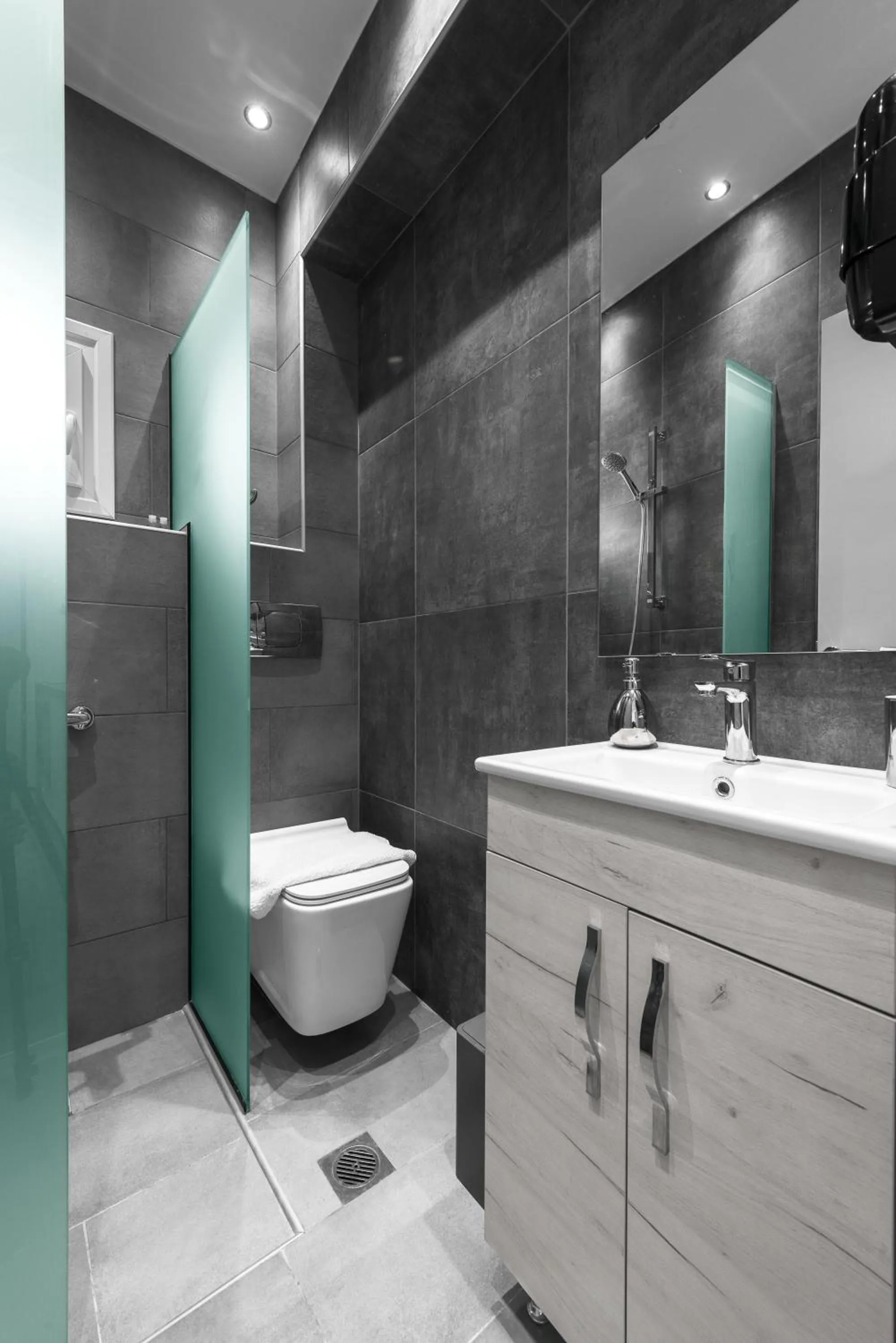 Shower in DeniZen Boutique Apartments, Nilie Hospitality MGMT