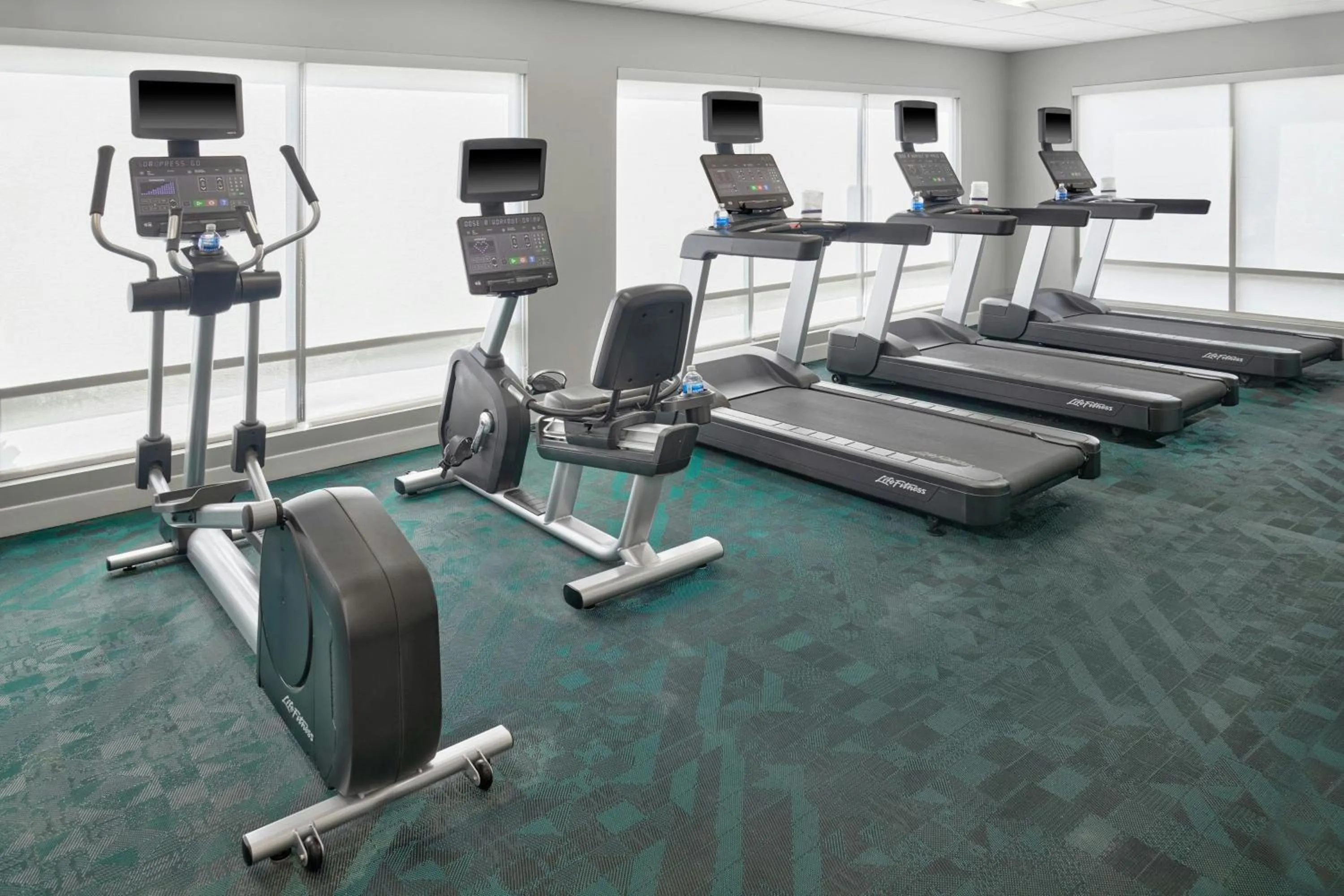 Fitness centre/facilities in TownePlace Suites by Marriott Lansing North