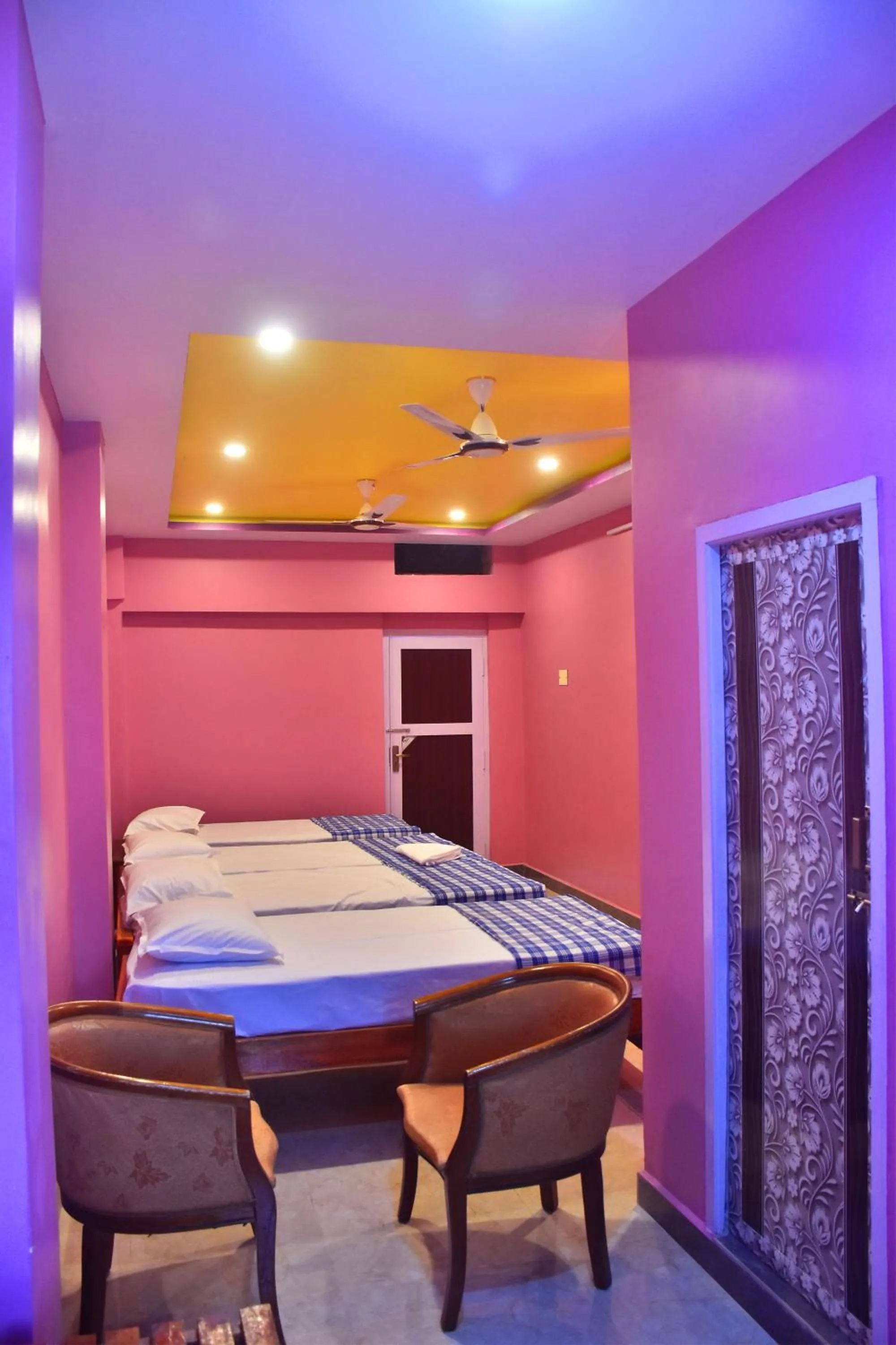 Bed in City Plaza Lodge