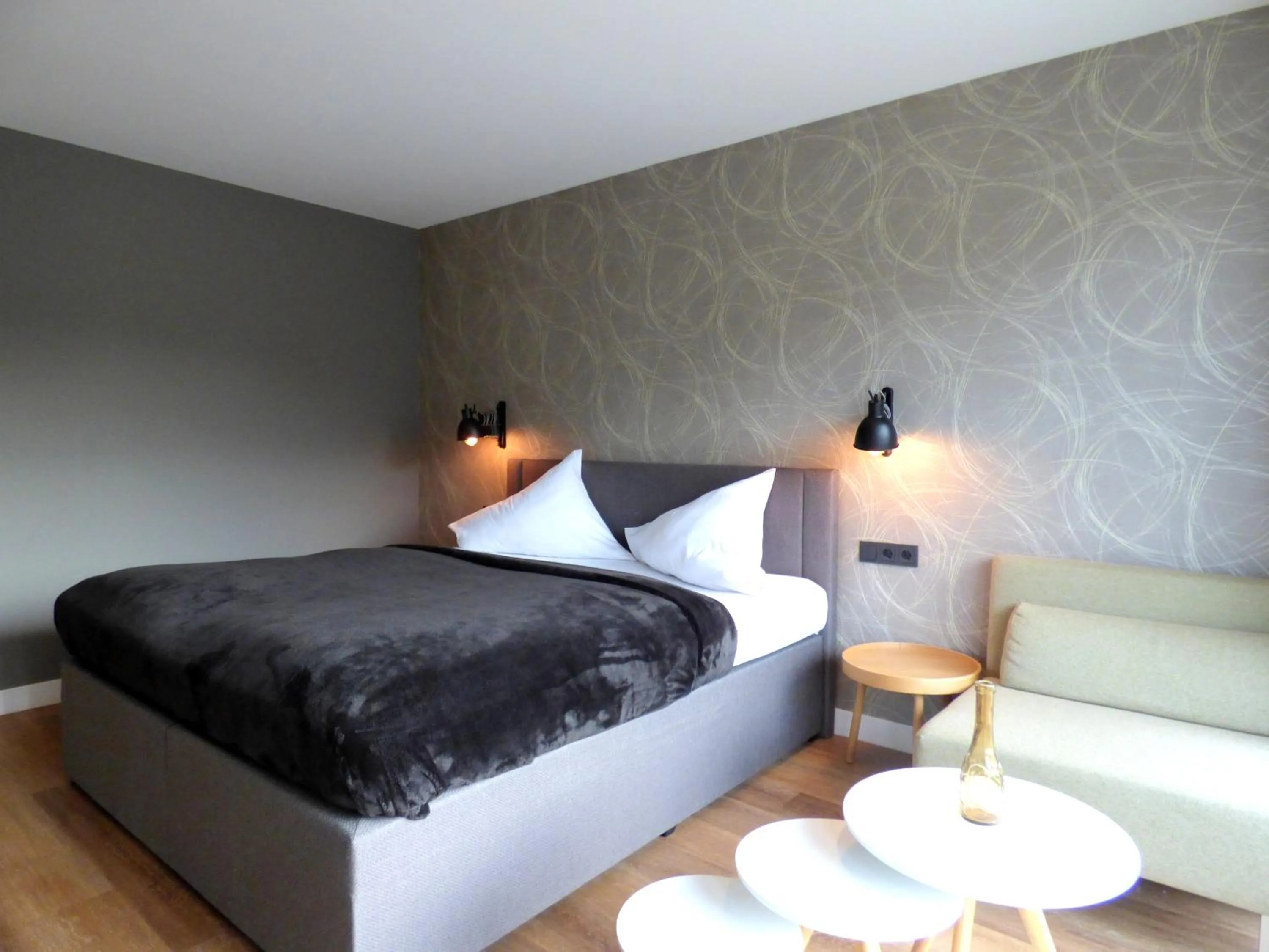 Bed in Niteroom Boutiquehotel & Apartements