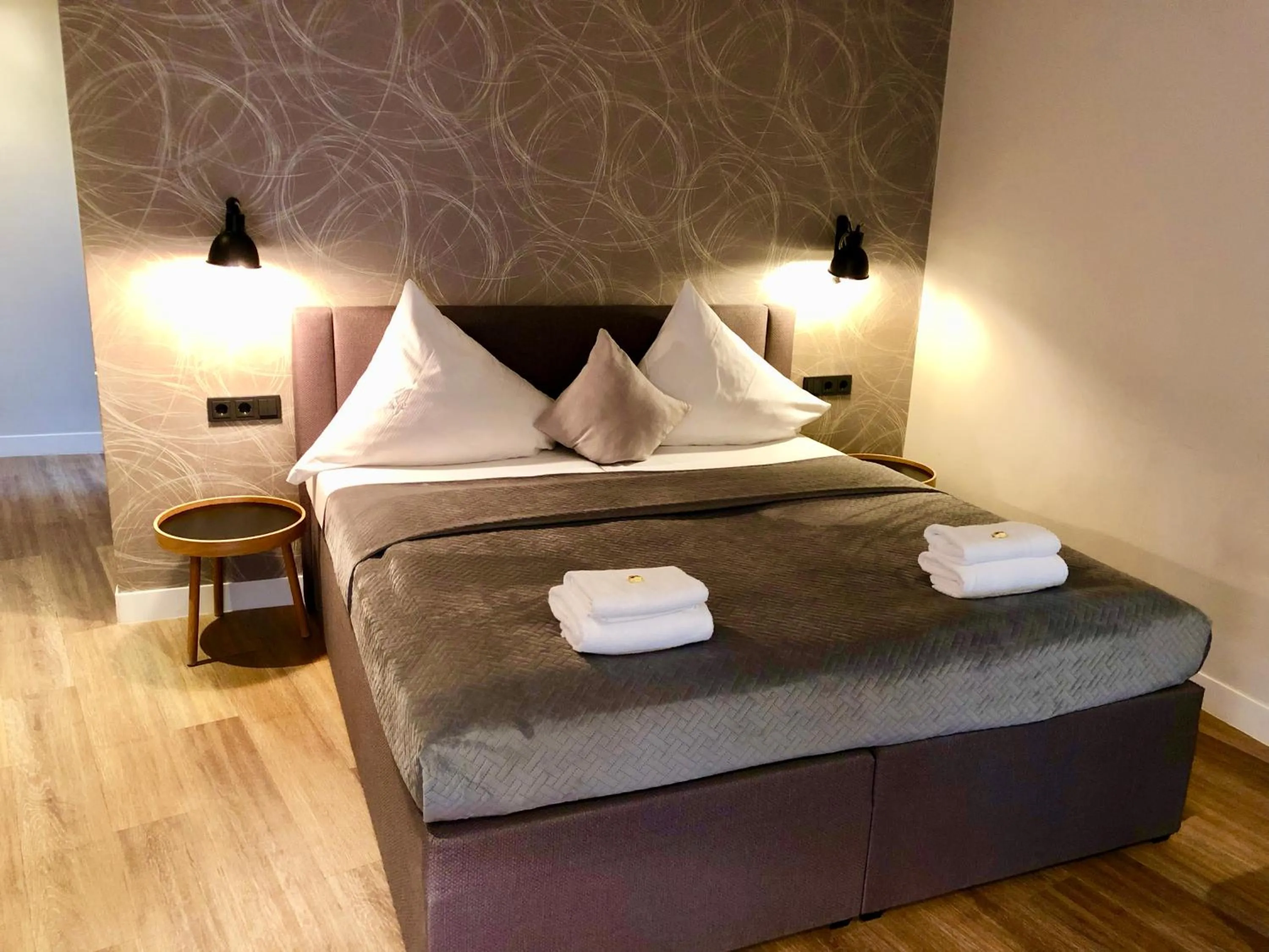 Bed in Niteroom Boutiquehotel & Apartements