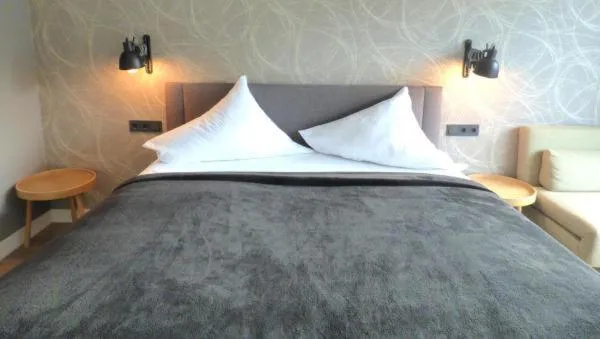 Bed in Niteroom Boutiquehotel & Apartements