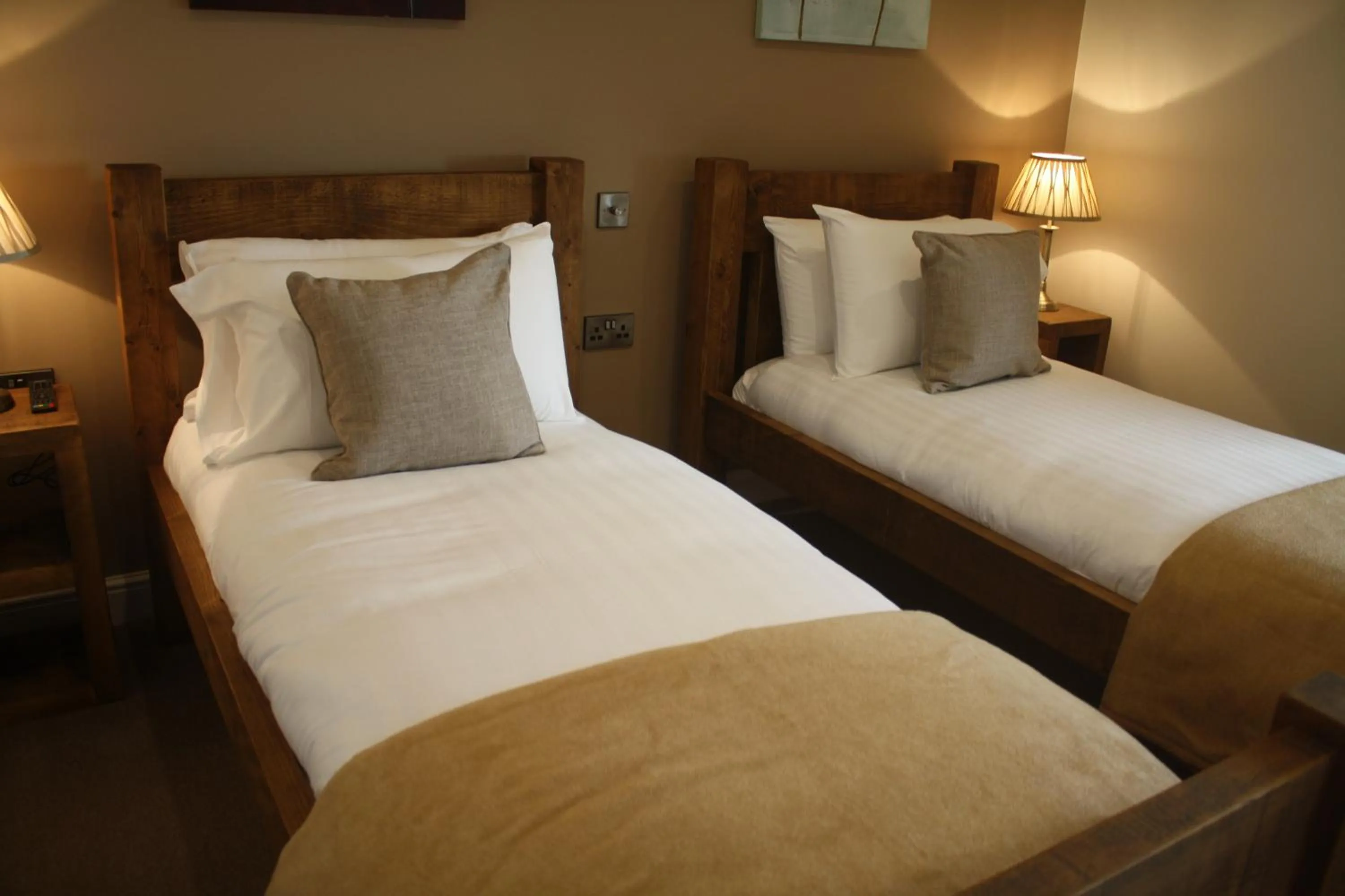 Bed in The Woodman Inn