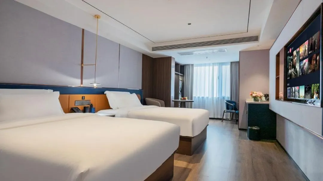 Bed in Mehood Hotel Xi'an Railway Station Wulukou