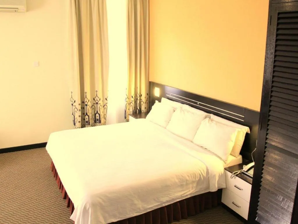 Bed in Perkasa Hotel Tenom