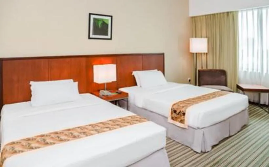 Bed in RH Hotel Sibu