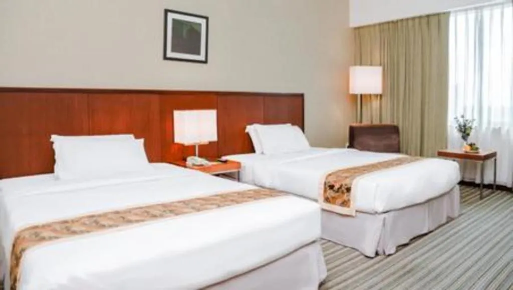 Bed in RH Hotel Sibu