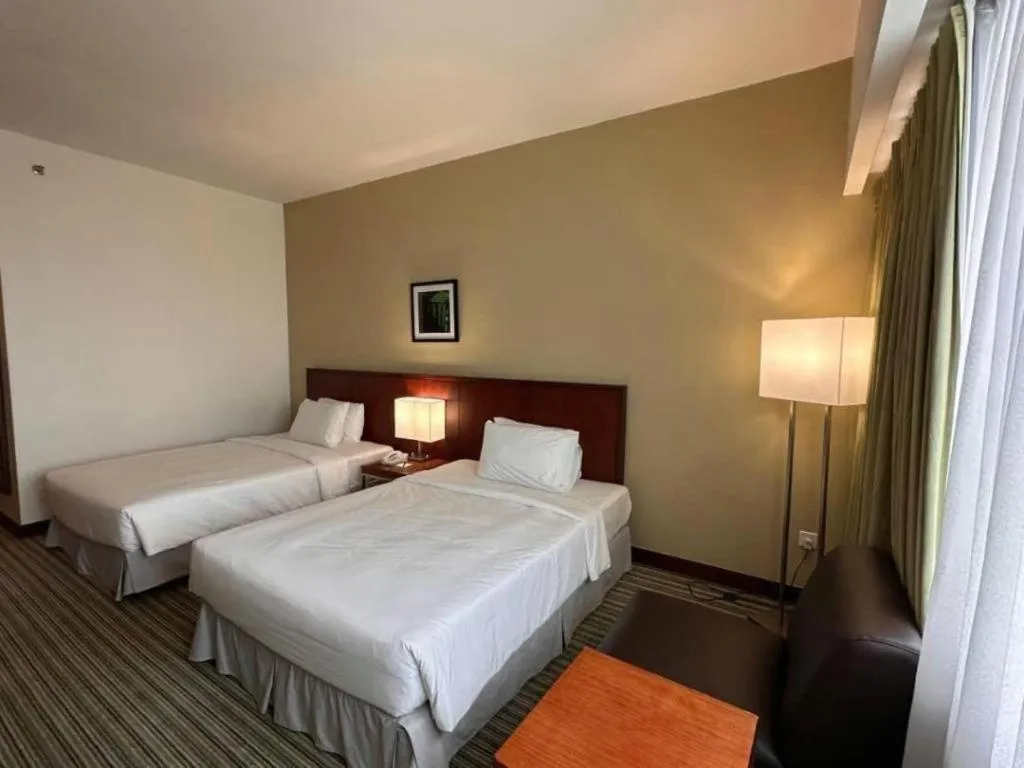 Bed in RH Hotel Sibu