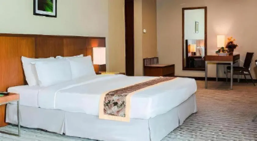 Bed in RH Hotel Sibu