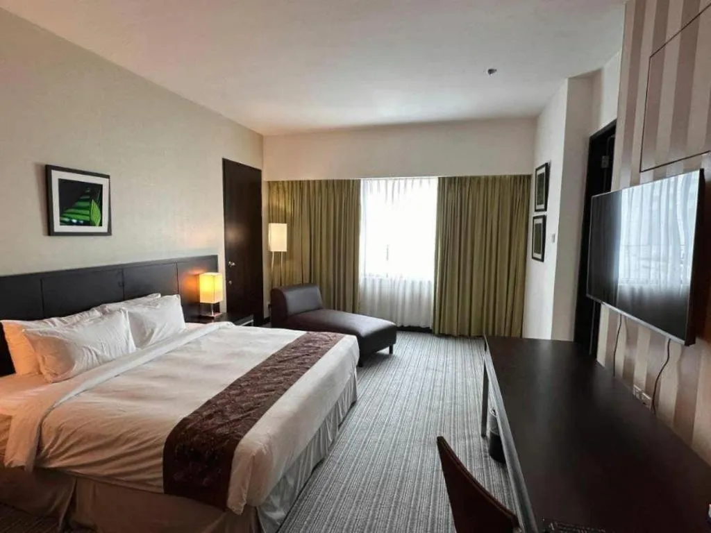 Bed in RH Hotel Sibu