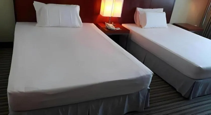 Bed in RH Hotel Sibu