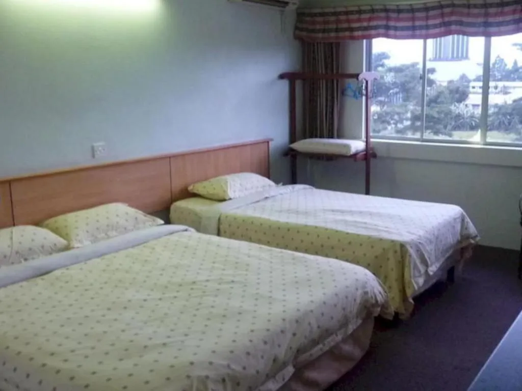 Bed in Hotel Hung Hung